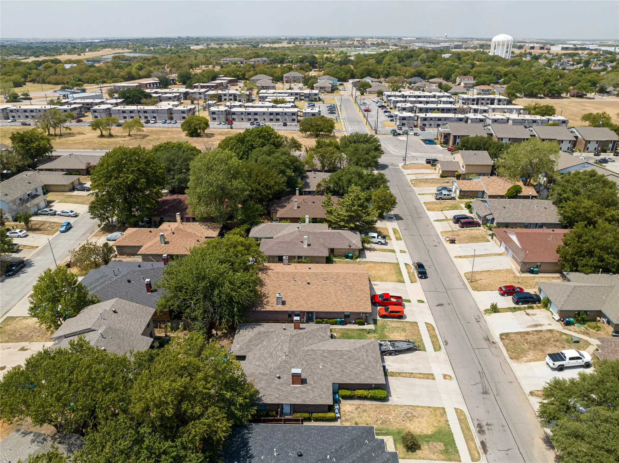 Birds eye view of property with a residential view