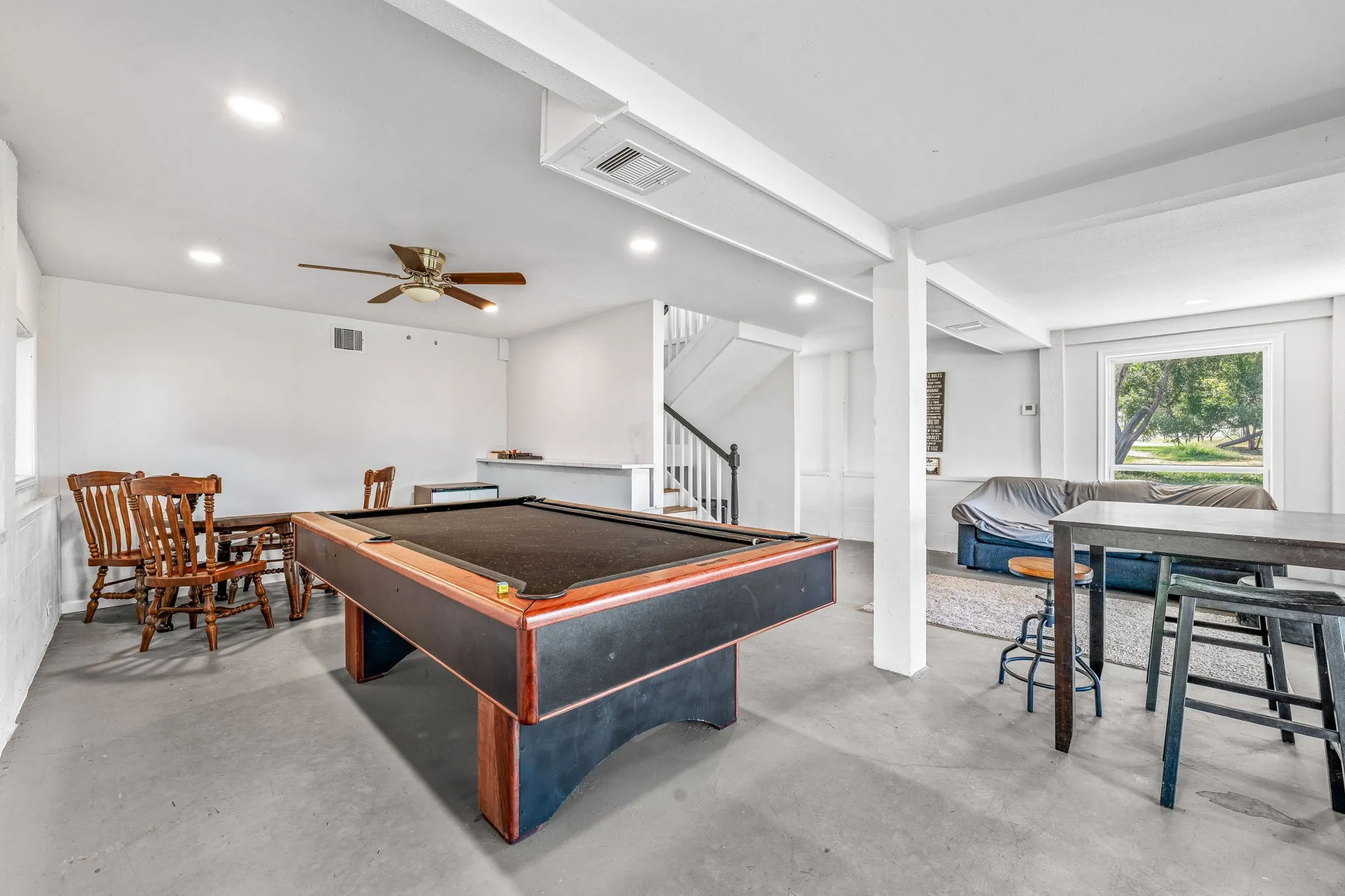 Rec room with billiards, concrete flooring, recessed lighting, and a ceiling fan