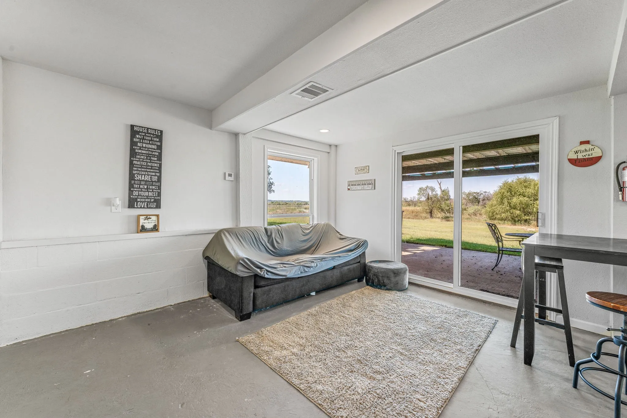 Living area with concrete floors