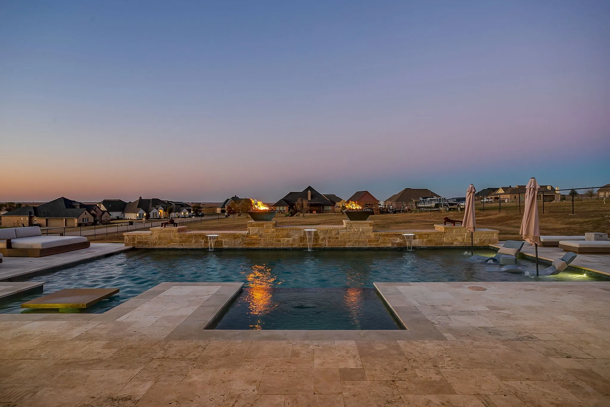 Travertine decking throughout