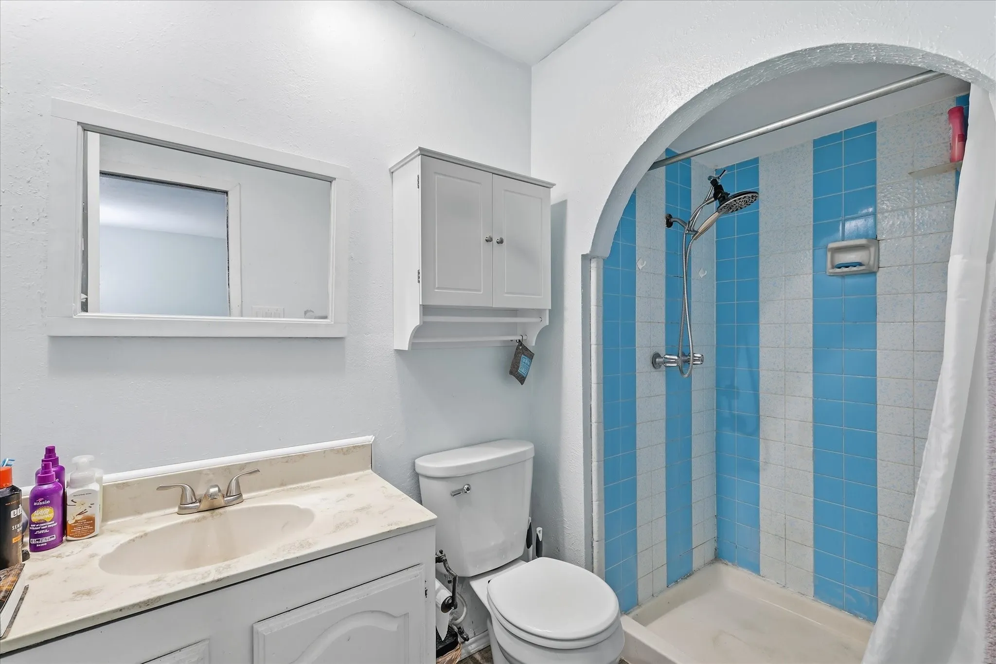 Attached primary en-suite bathroom situated privately away from secondary bedrooms.