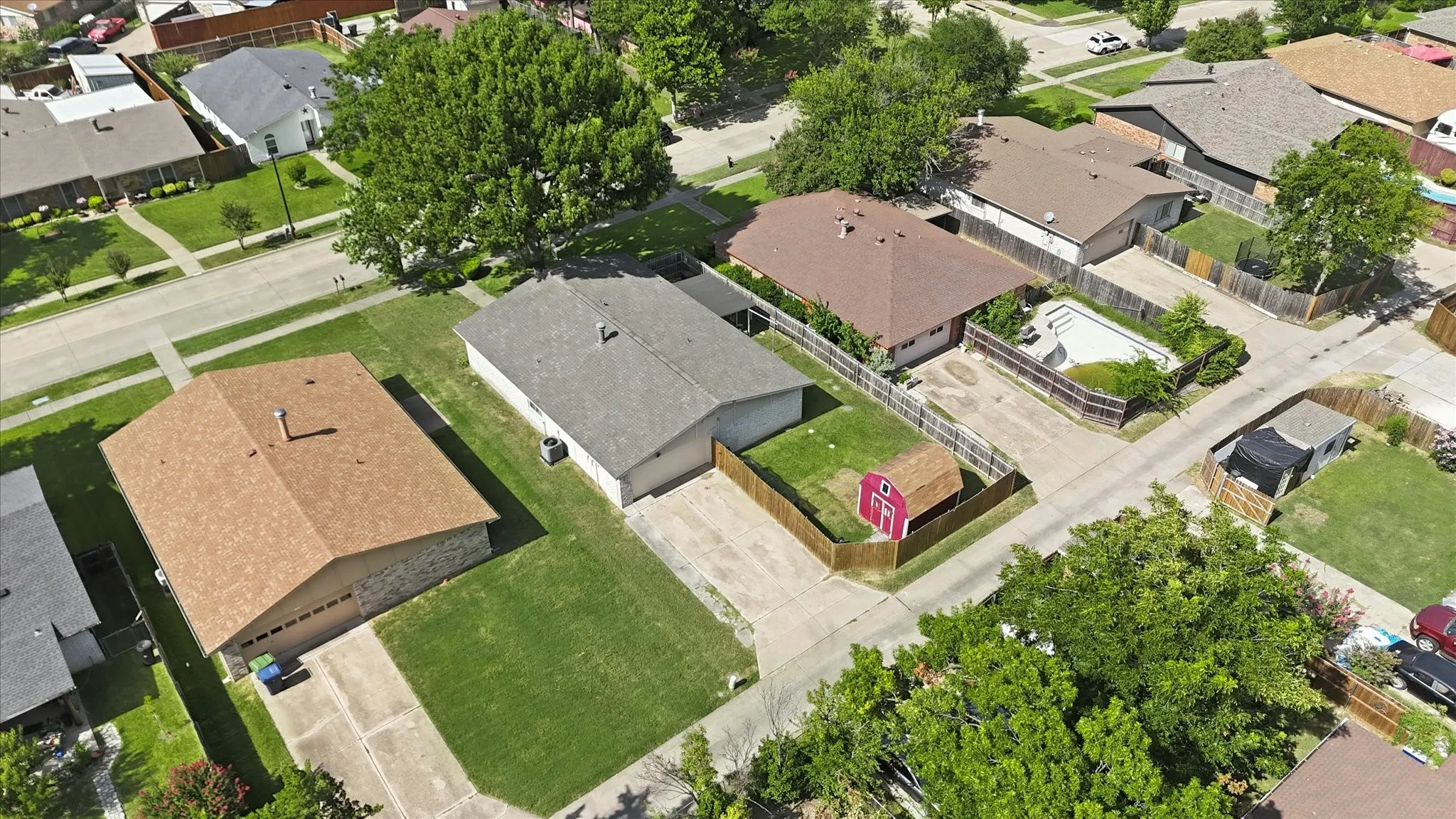Unconverted, full 2-car garage space providing secure parking and storage.