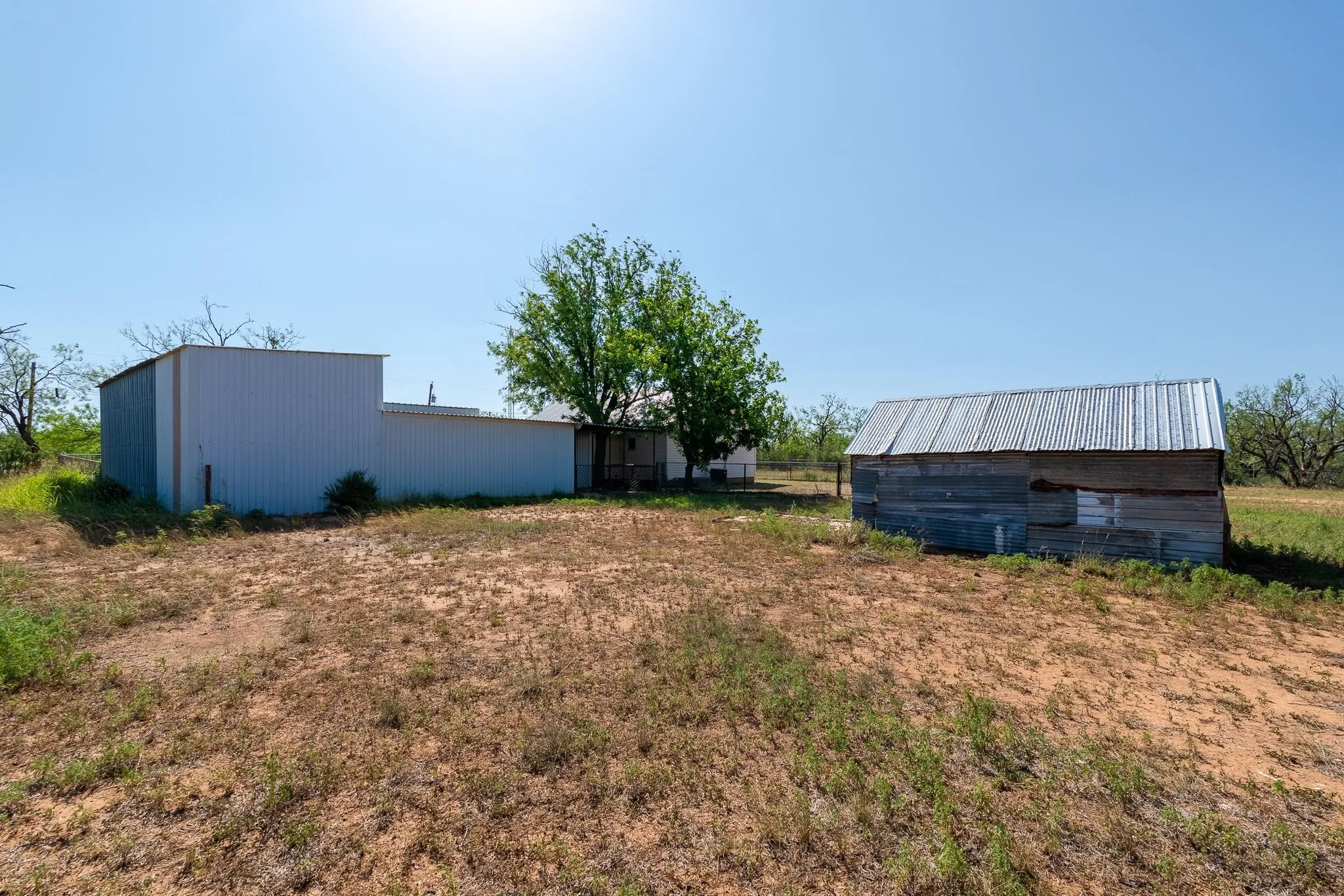 Spacious lot featuring two outbuildings