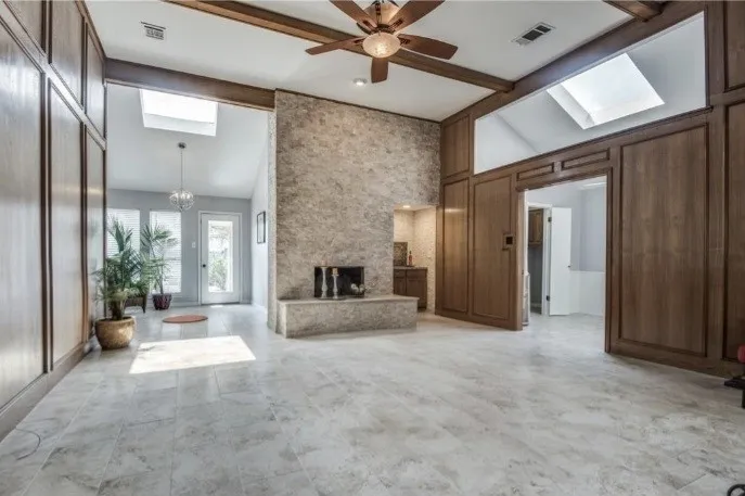 Marble tile underneath the carpet. Remove the carpet to reveal the original tile marble flooring and bring out the home classic character.
