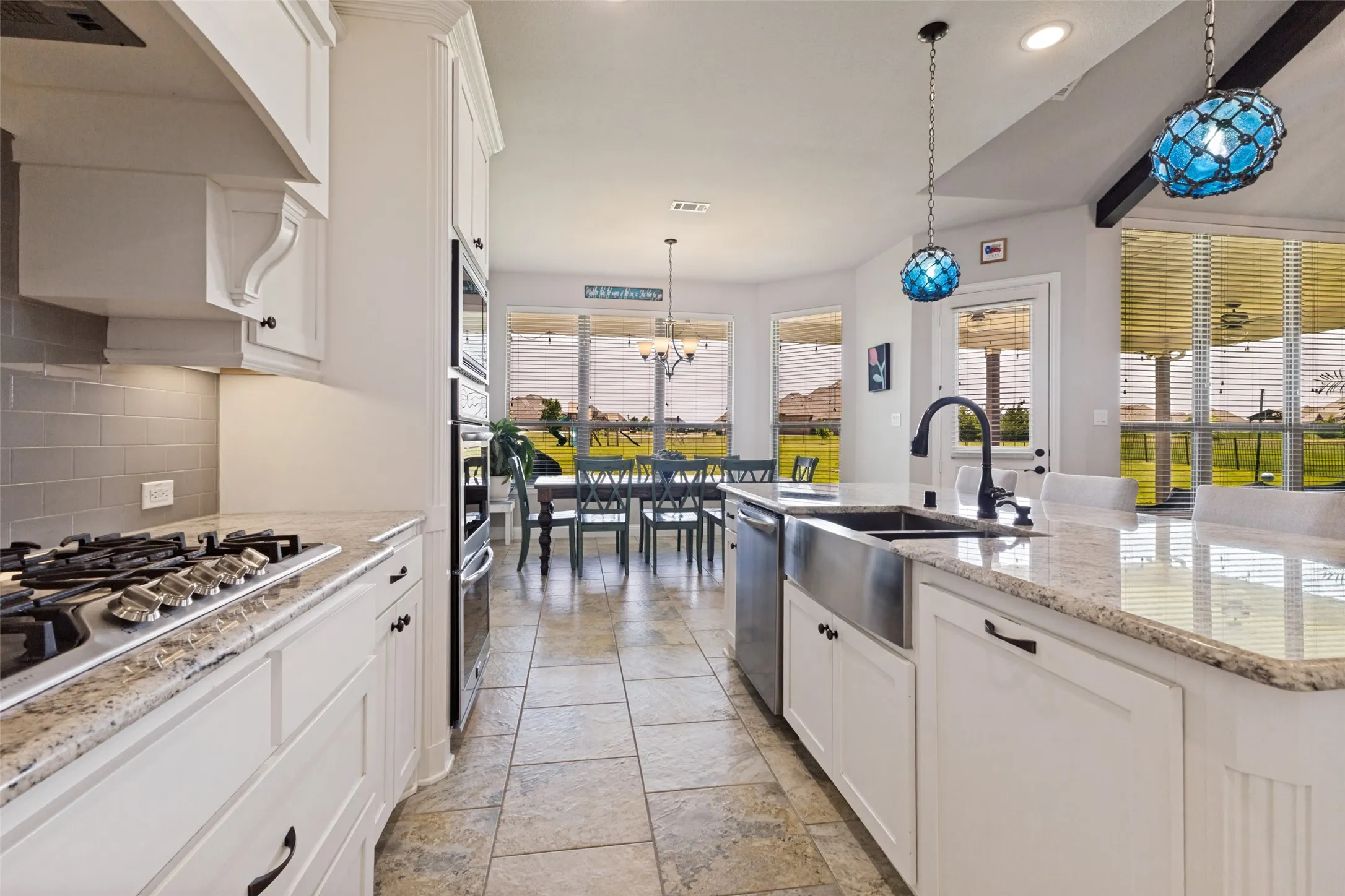 A kitchen straight out of Southern Living! Don't miss that gorgeous farm sink!