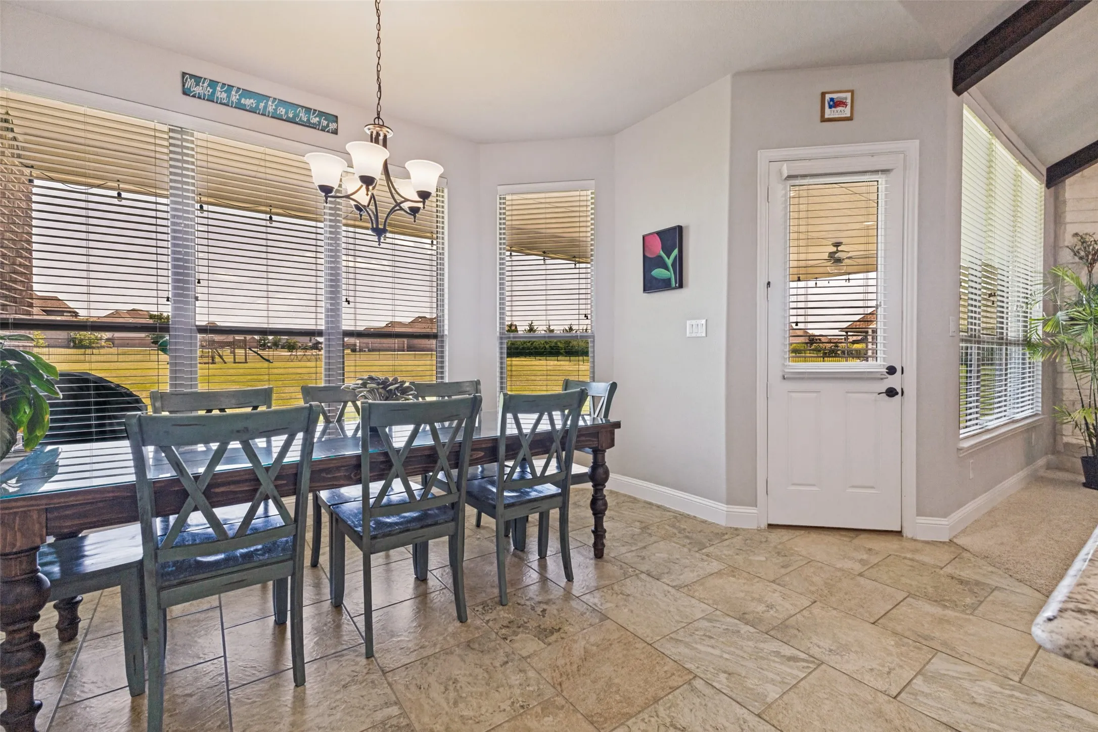 Family dining overlooking that amazing back yard!