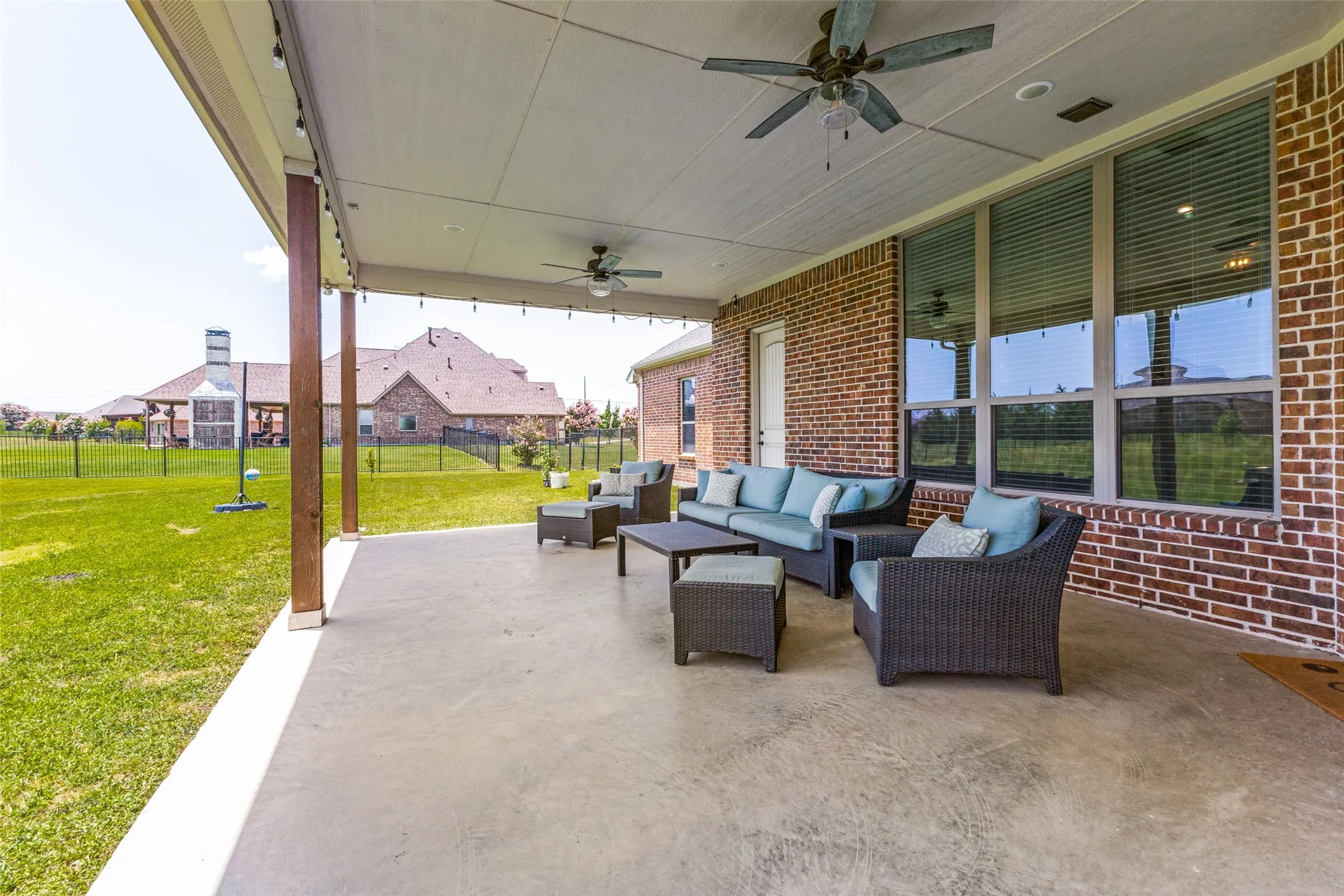 Dual ceiling fans on this amazing patio!