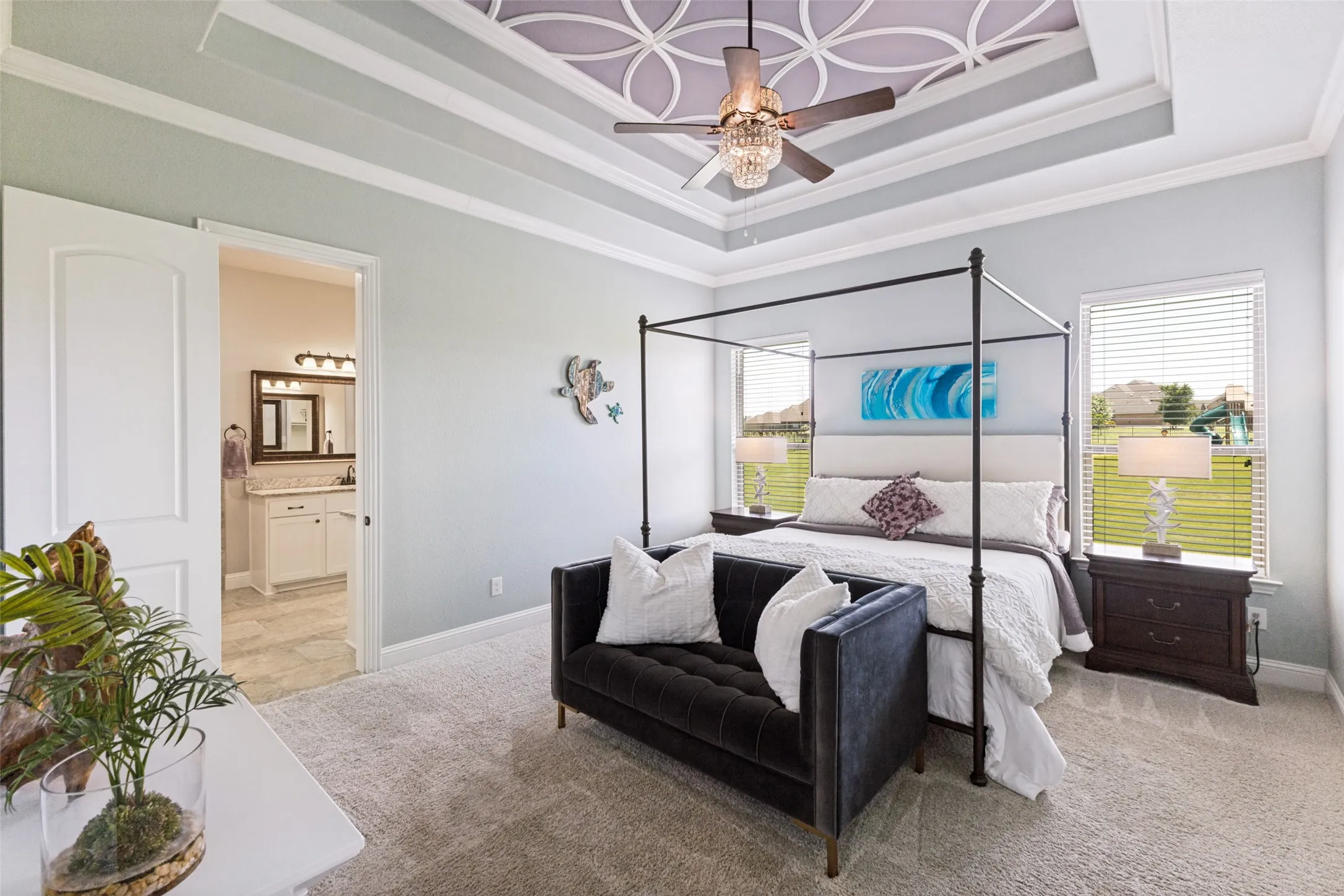 Primary Bedroom that is so oversized, it accommodates additional sitting!
