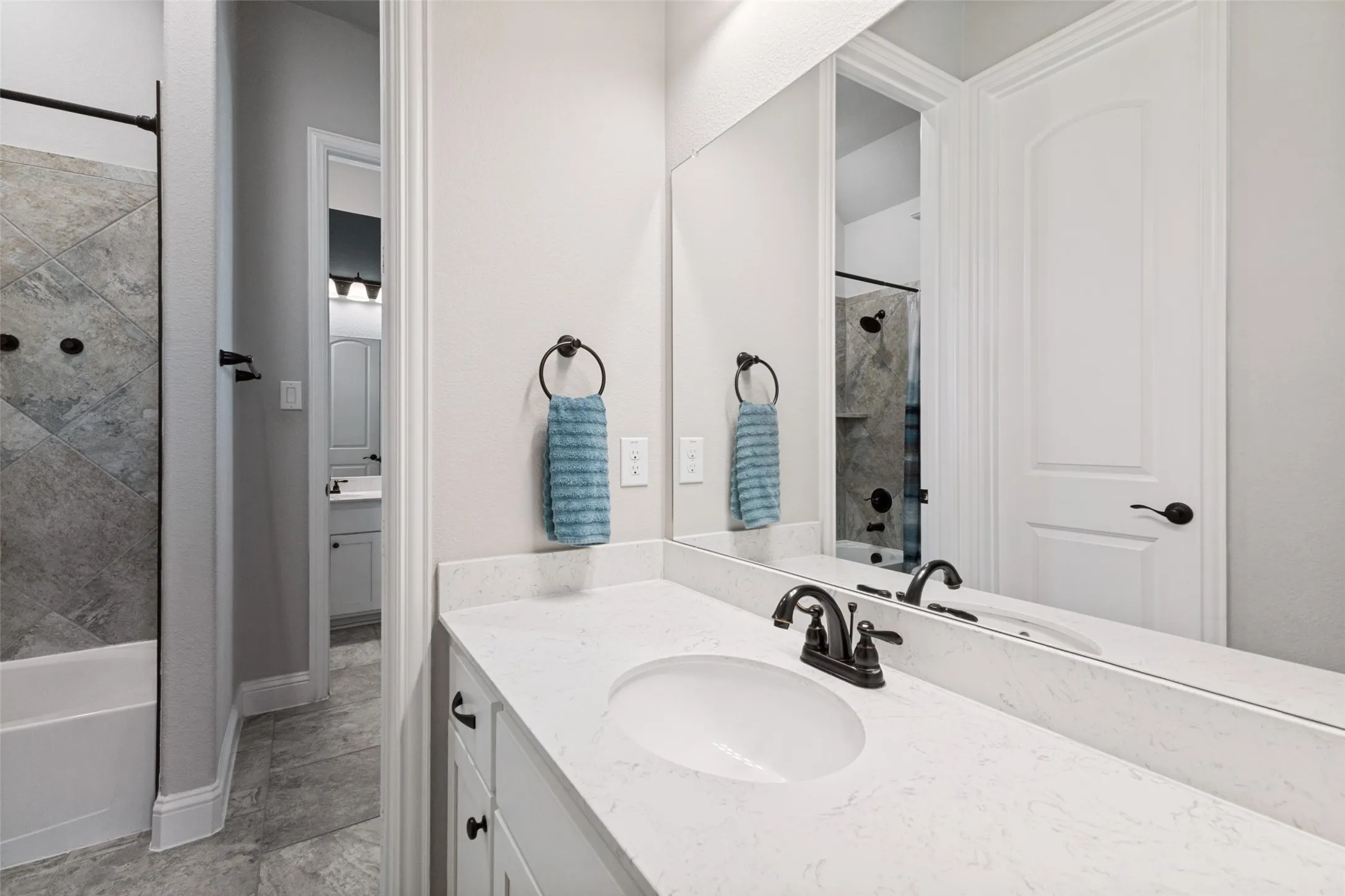 Jack and Jill Bath between two of the secondary bedrooms.