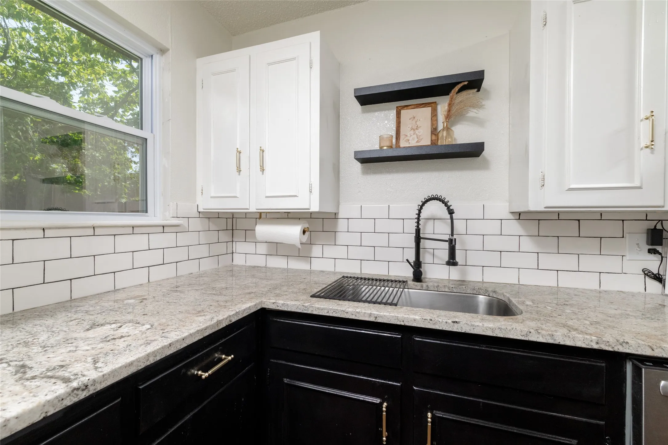 Granite Countertops and Tiled Backsplash