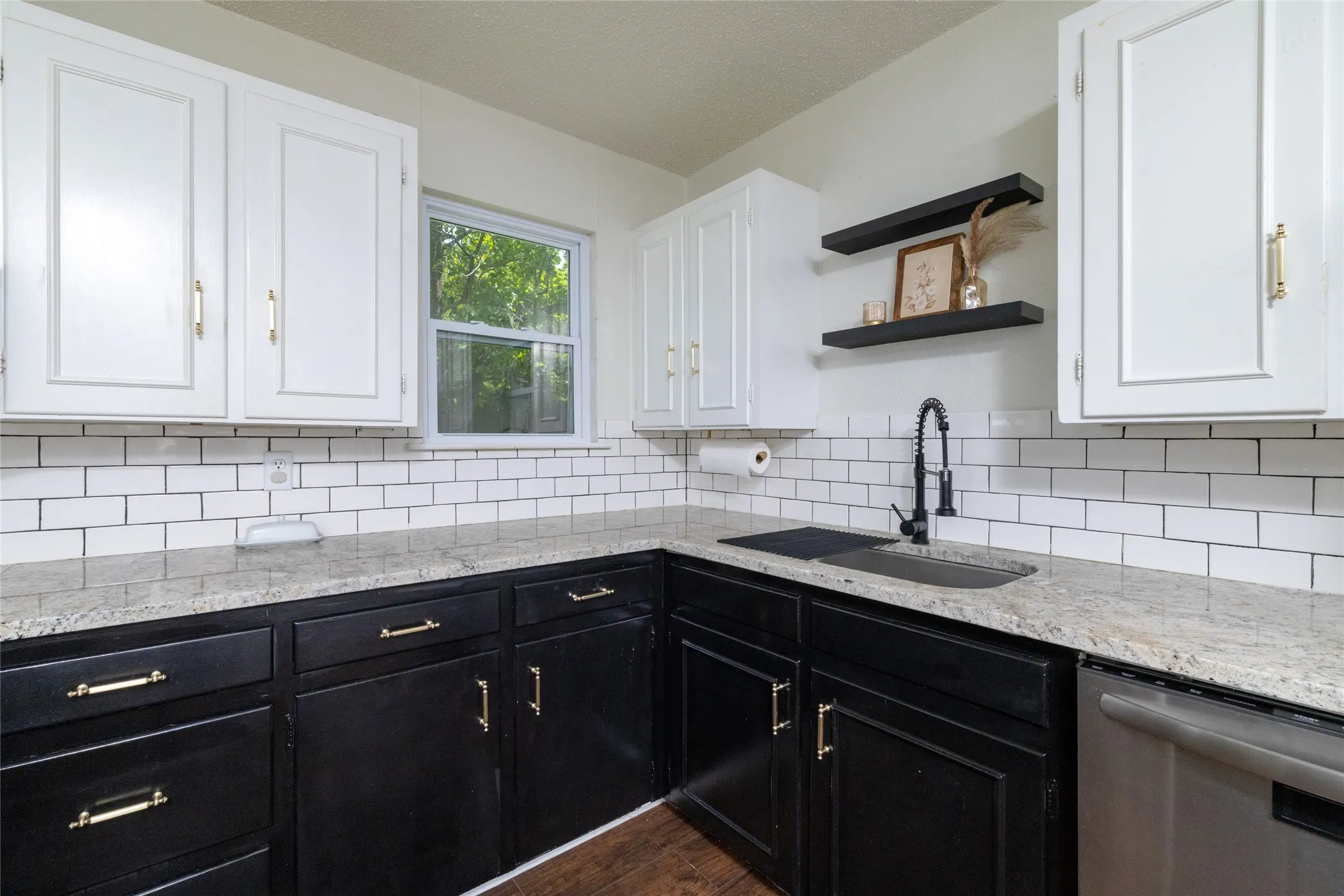 Granite Countertops and Tiled Backsplash