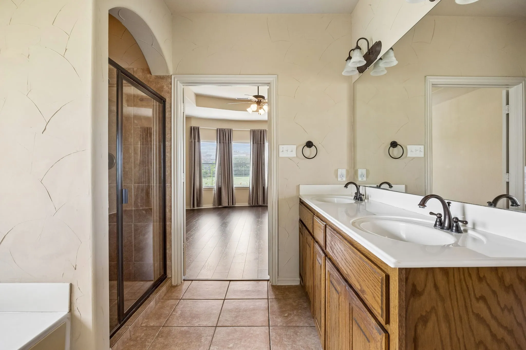 Dual sinks. Large tub. Separate shower.