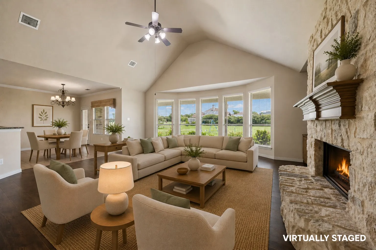 Built in shelves and an amazing mantle with soaring ceilings really make this room stand out.