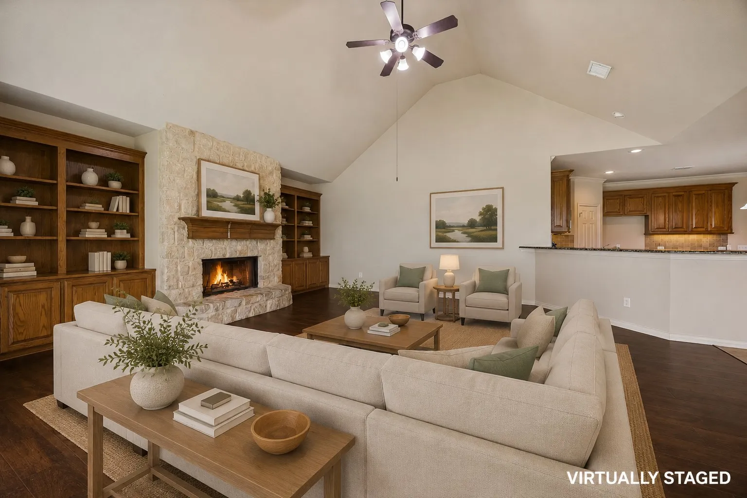 Built in shelves and an amazing mantle with soaring ceilings really make this room stand out.