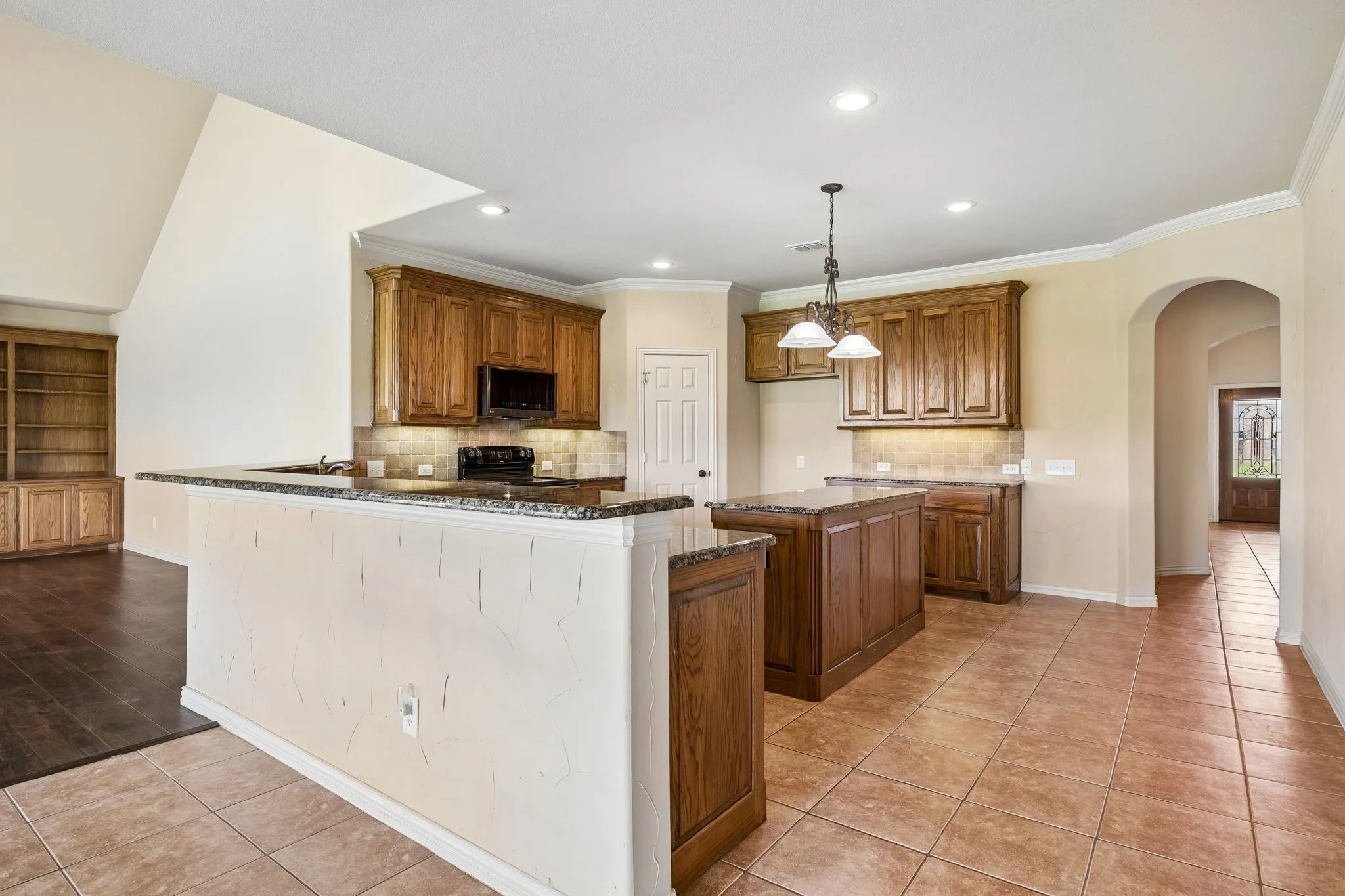 This kitchen has so much to offer! Massive amounts of cabinet and counter space.