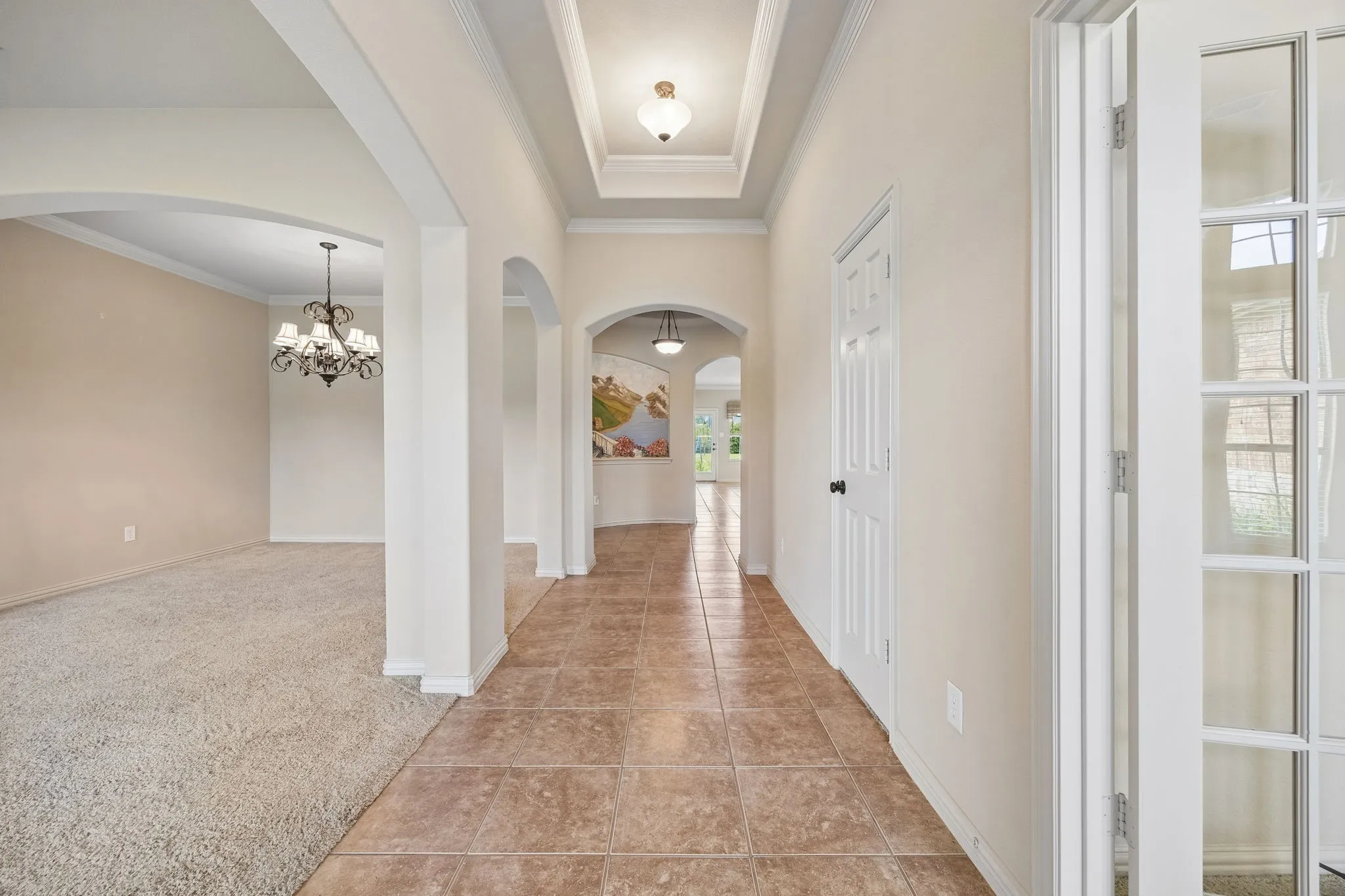 Standing at front door. Office, flex space on right. Formal dining & living on left.