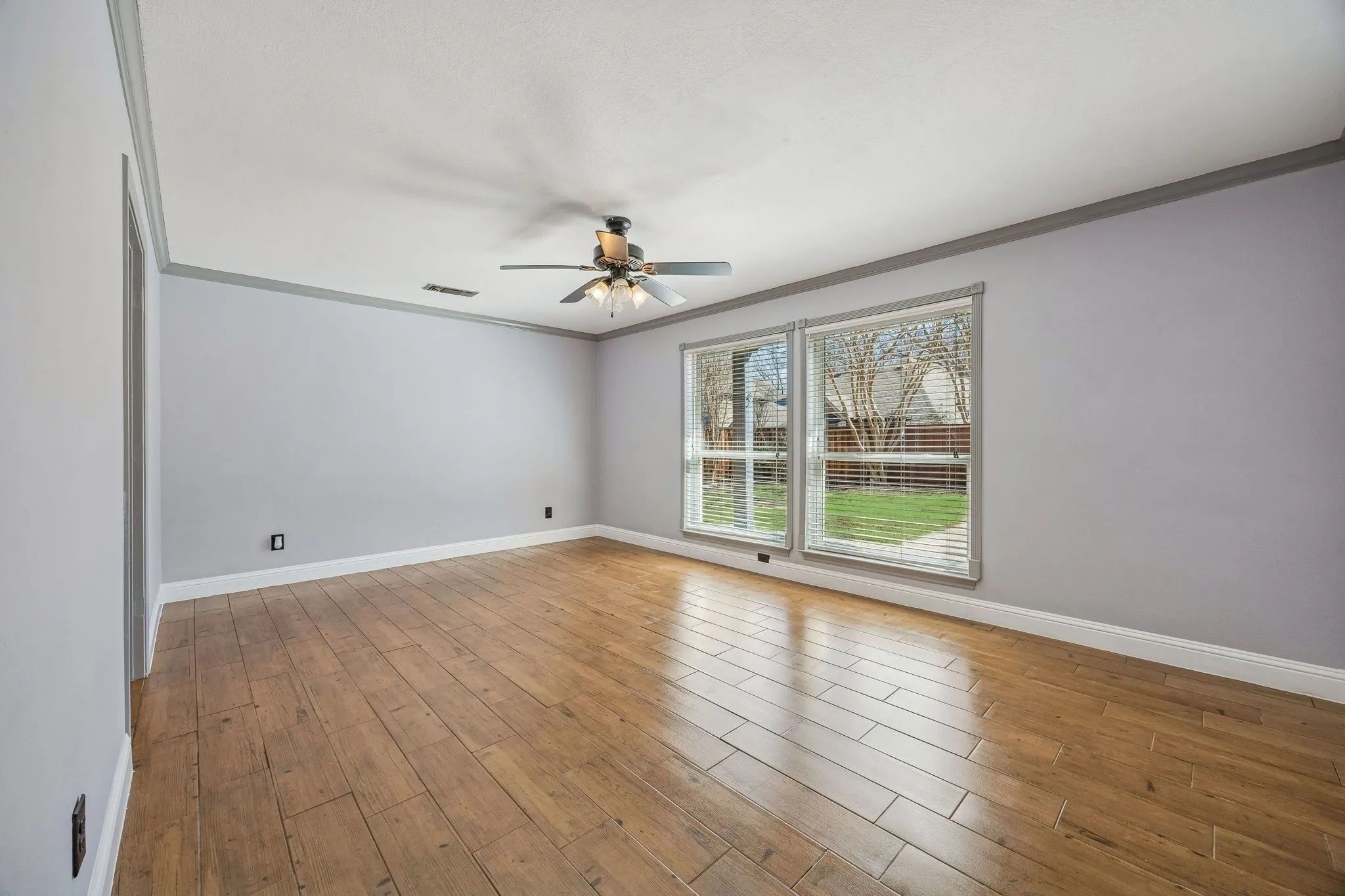 The primary is situated on the back of the home and is separate from all rooms for ultimate privacy.