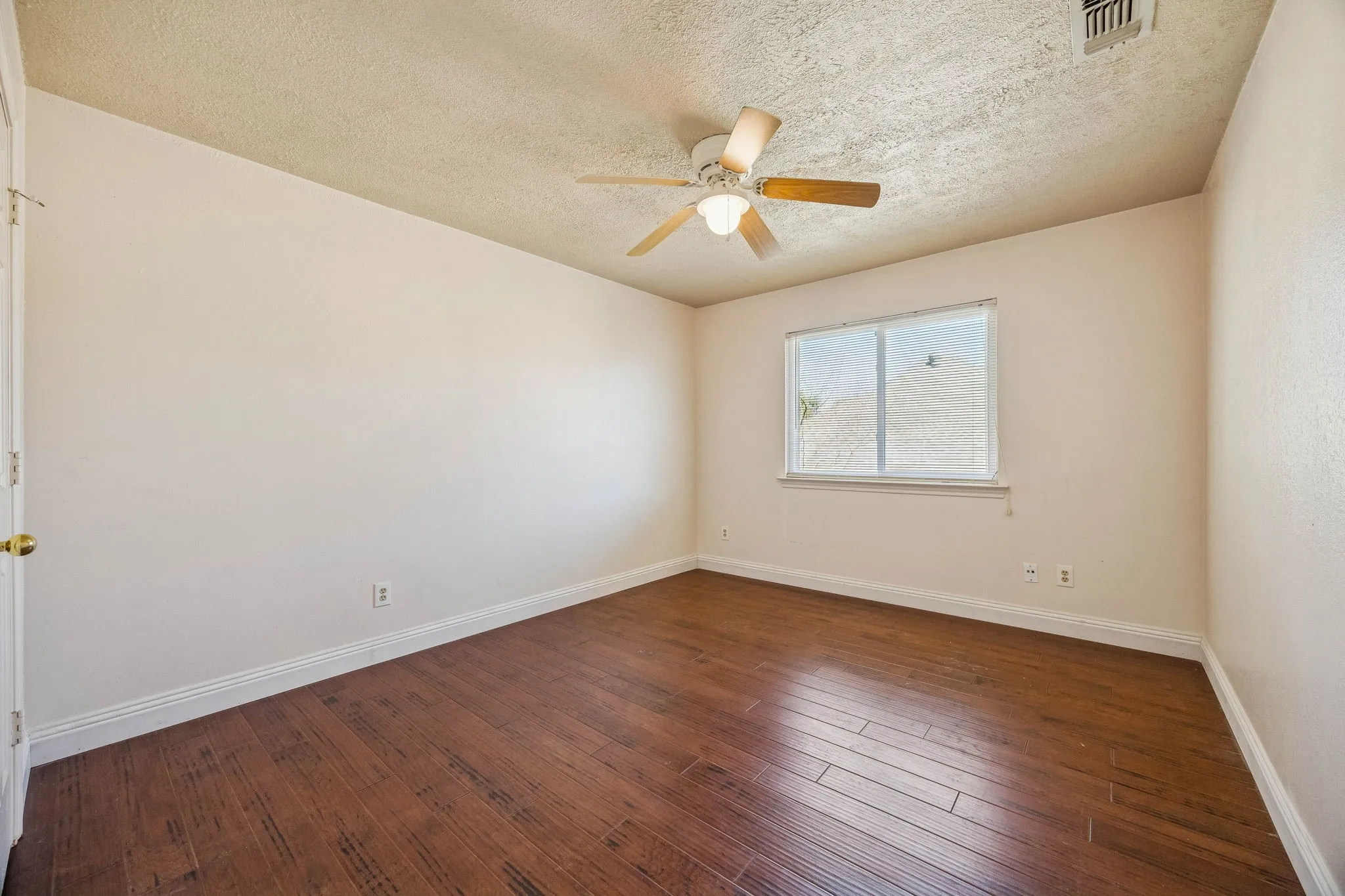 One of 3 secondary upstairs bedrooms. Again the hardwood continues.