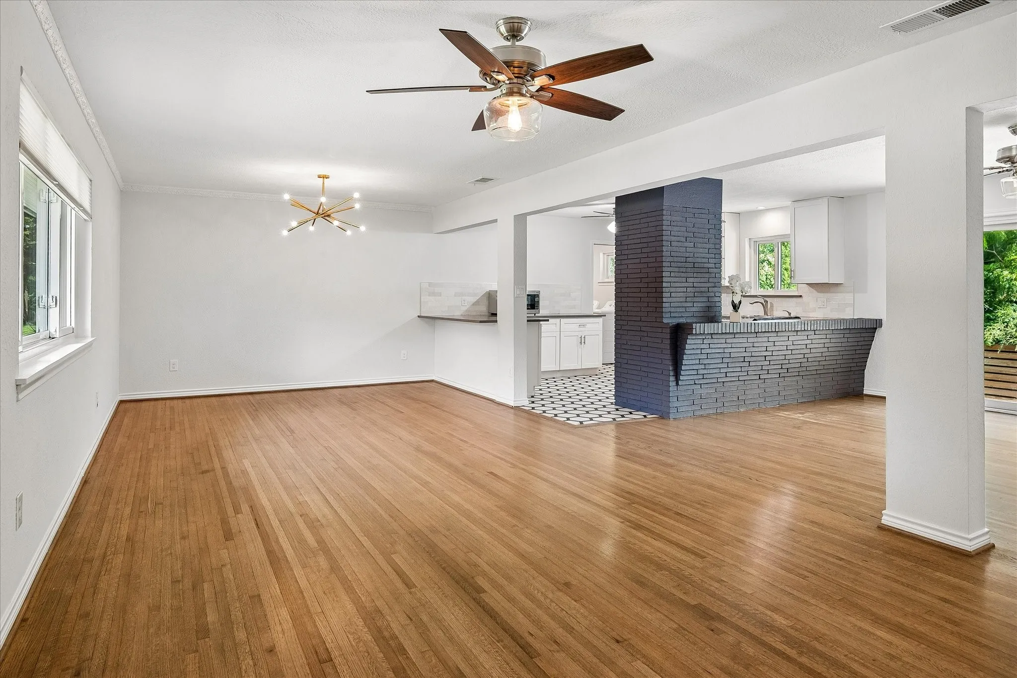 You are welcomed to an expansive and open living/dining and family room area. True hardwood floors are in all main living rooms and all 4 bedrooms.