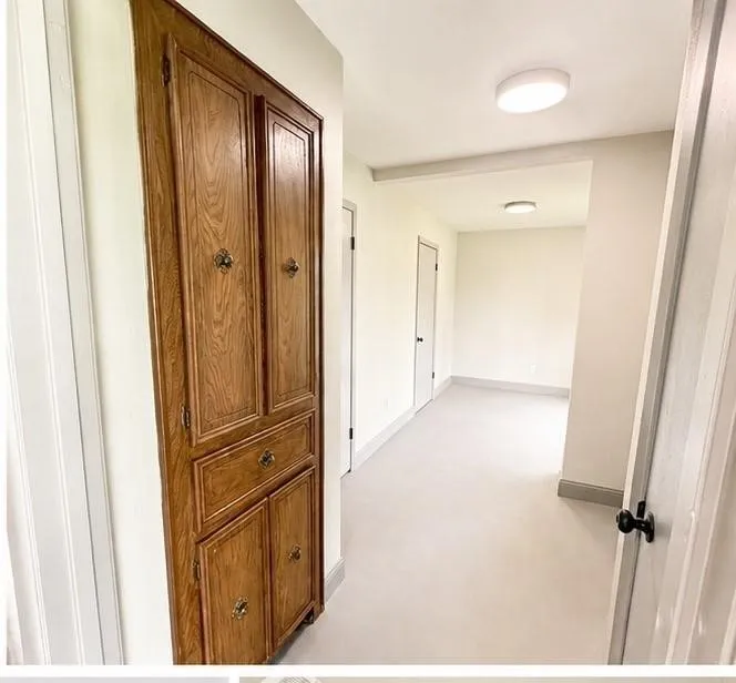 Built-in wood cabinetry with decorative hardware