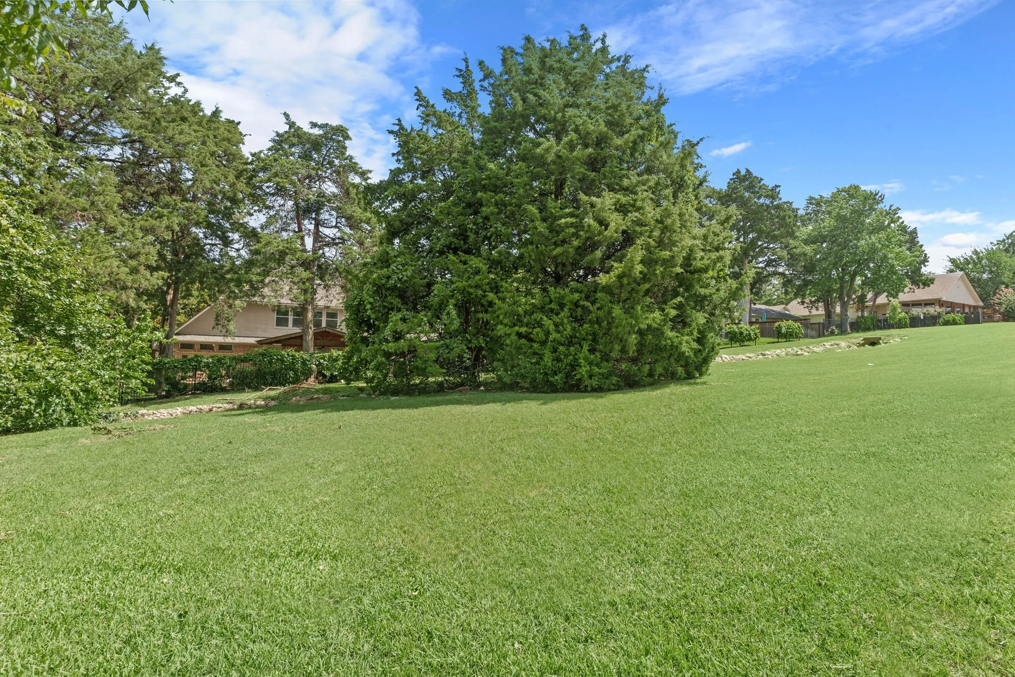 A gate at the back fence takes you to a near private community greenbelt for an added half acre of "extended" backyard.