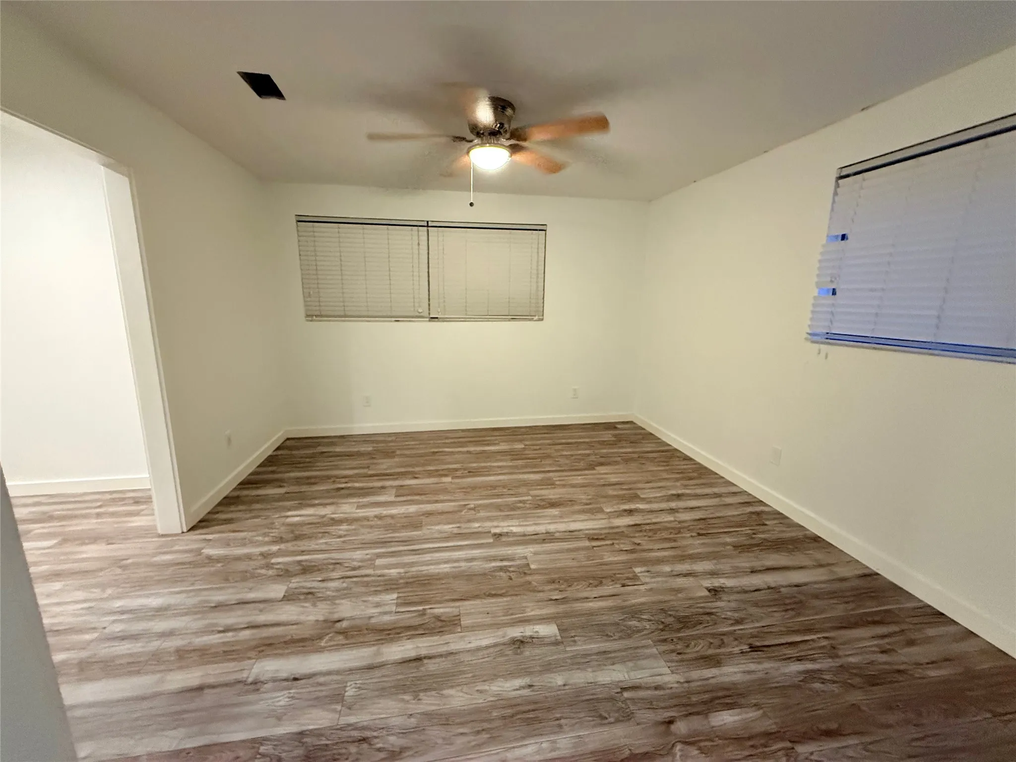Front room, can be used as another dining room, extra living room, or an open office/study.