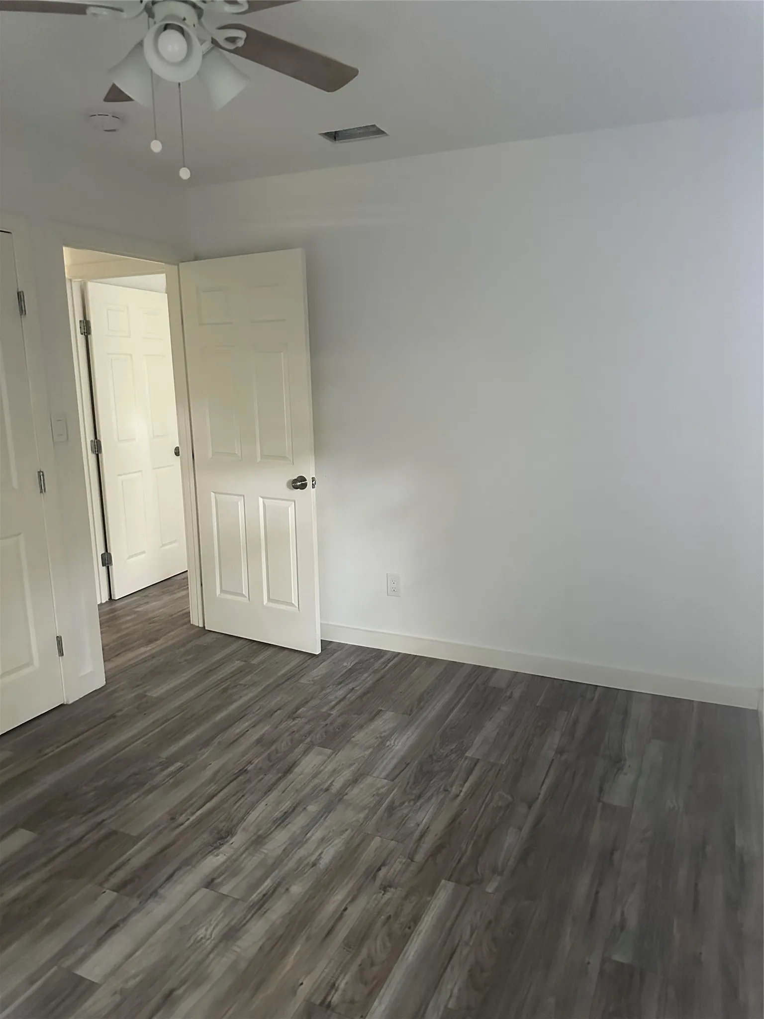 Bedroom 3 just to the right of bedroom 2 at the end of the hallway.