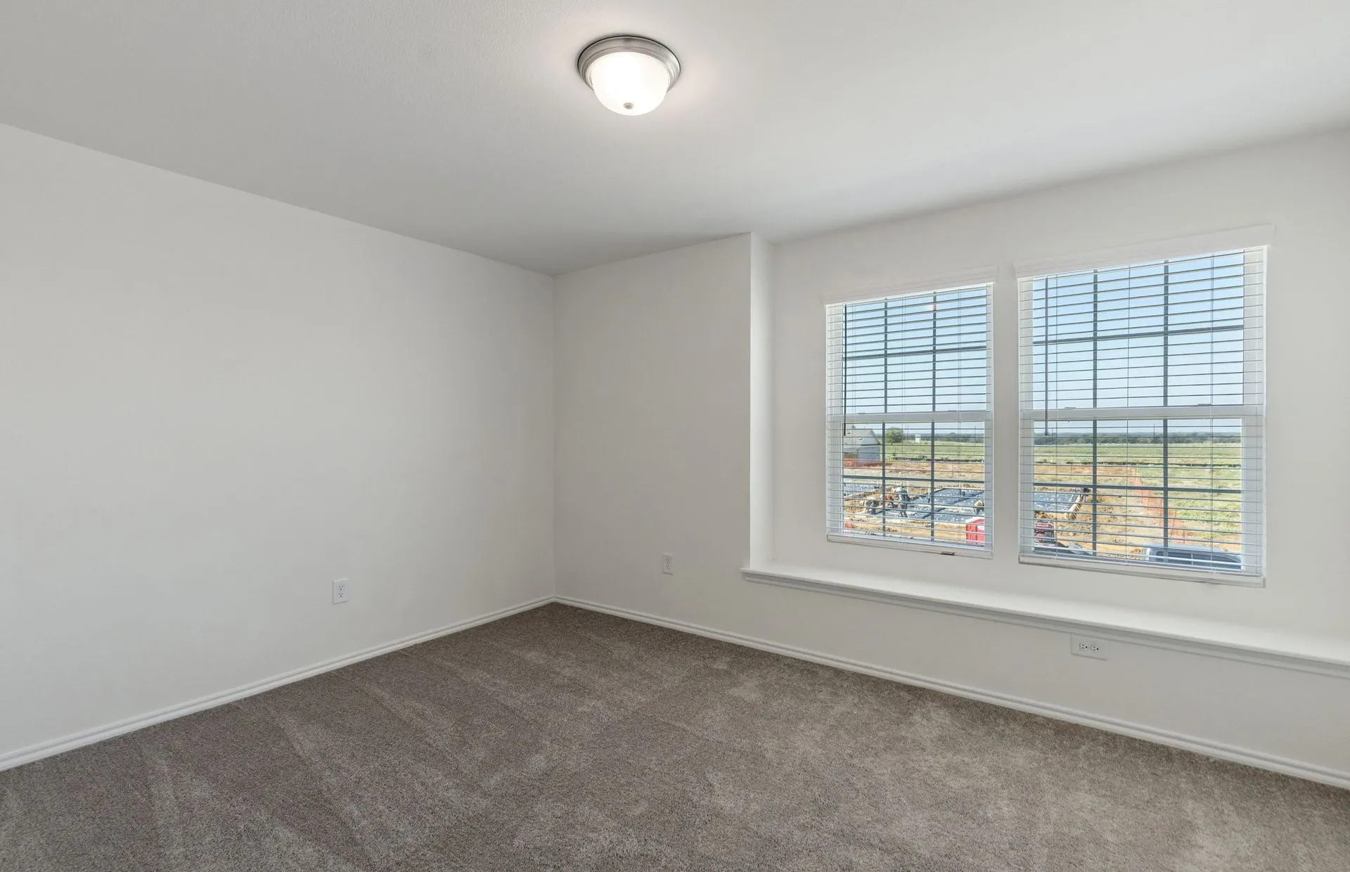 *Floorplan representation, not actual home - Spacious secondary bedroom with large windows