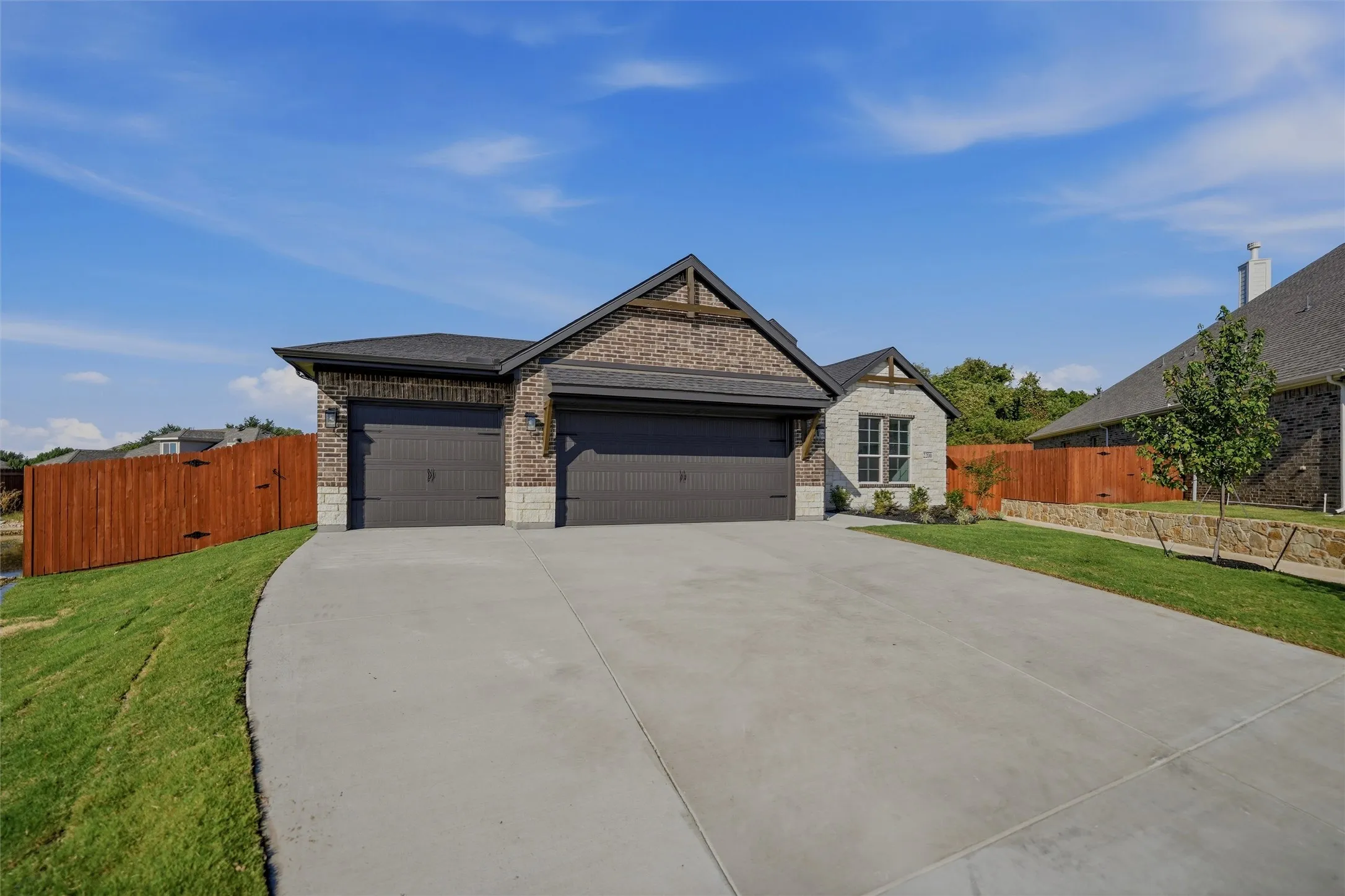 Brick and stone exterior with decorative gable accents