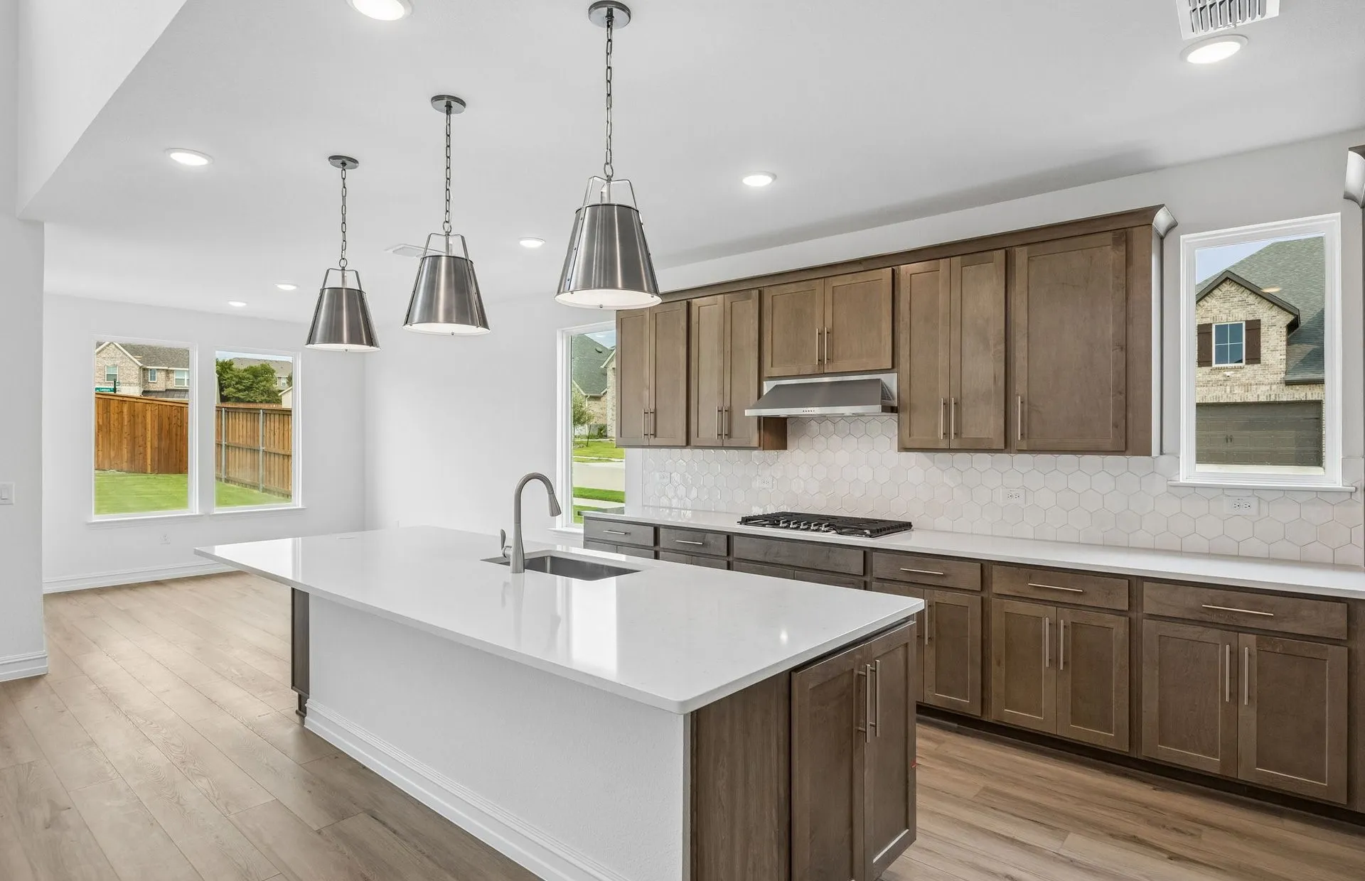 Beautiful kitchen with pendent lighting