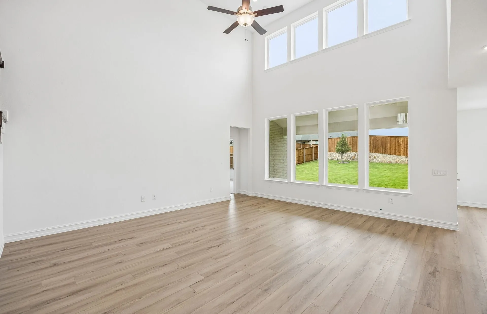 Soaring ceilings and large windows in kitchen