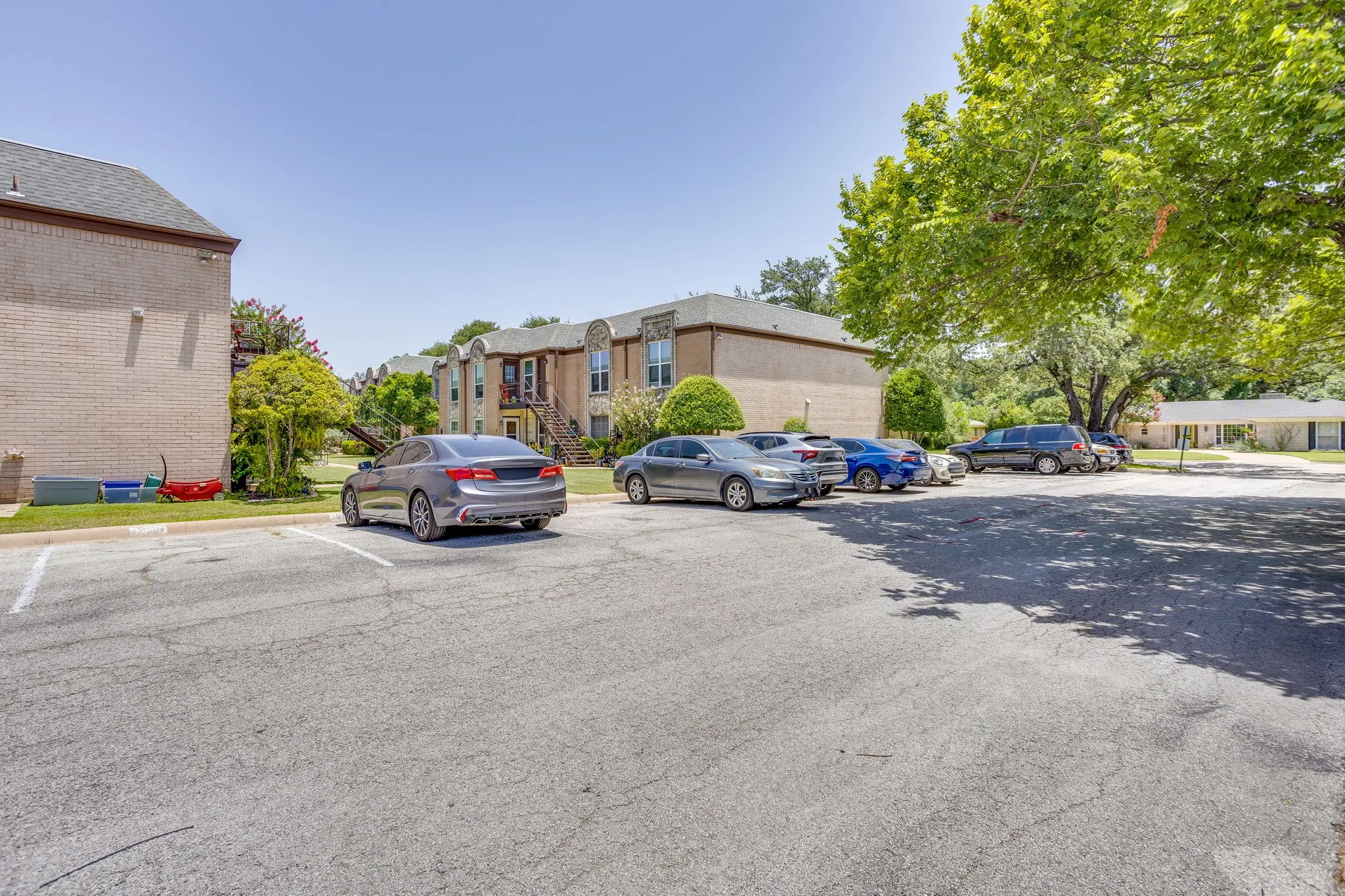 Paved parking lot featuring multiple reserved marked spaces