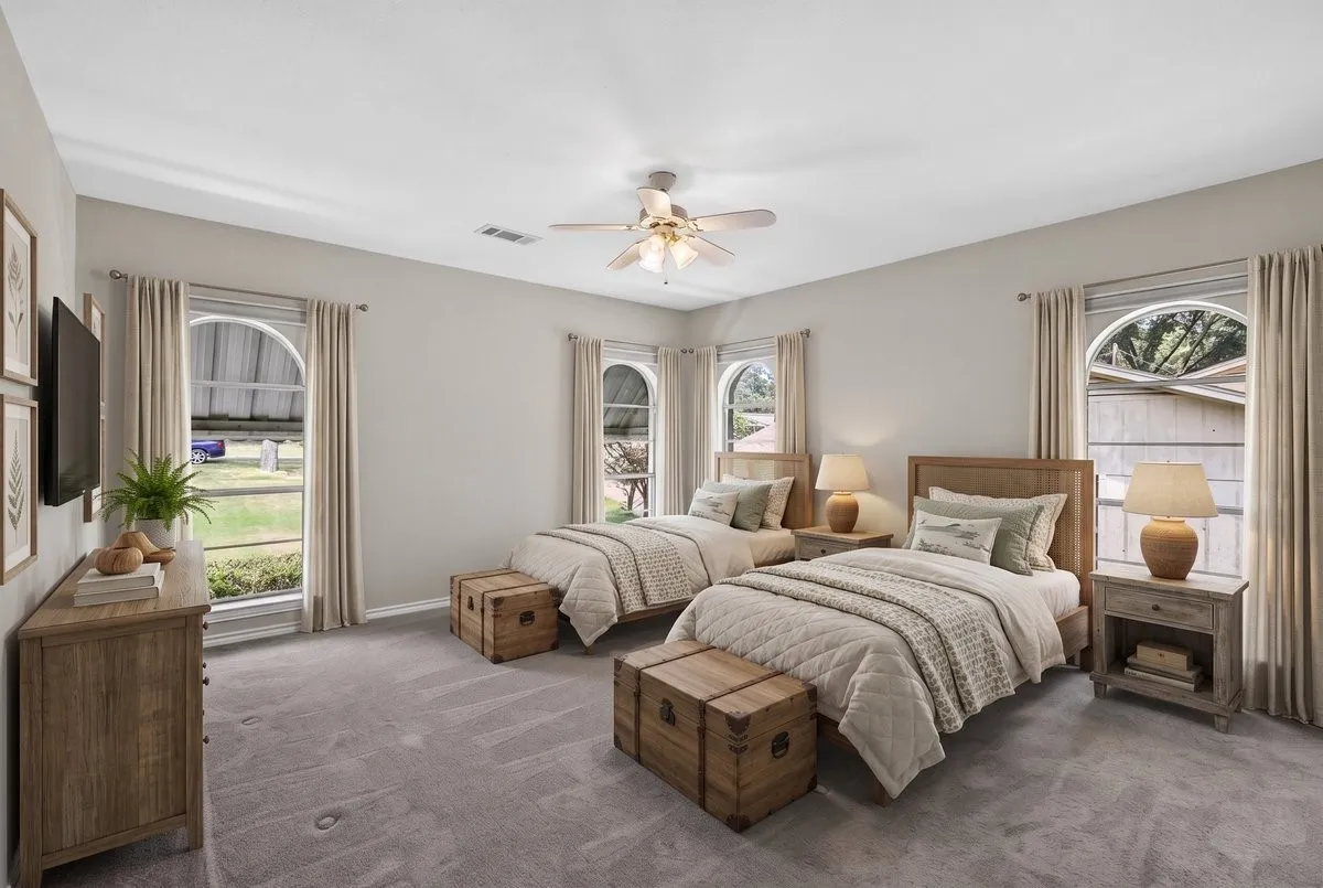 Virtually Staged #2 Primary Bedroom on the street side with plenty of natural light through 4 floor to ceiling windows and an ensuite bathroom