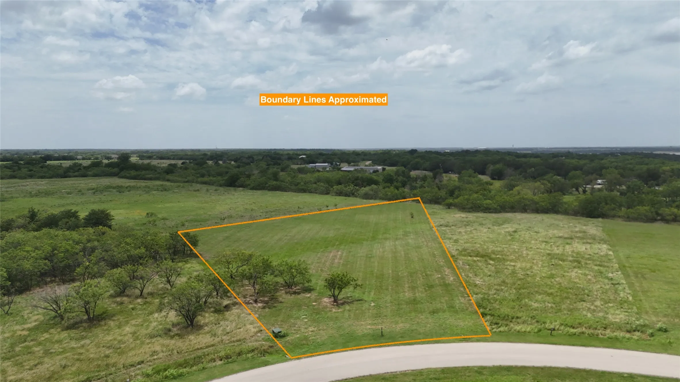 Aerial perspective reveals the property's location within the peaceful Central Texas countryside.