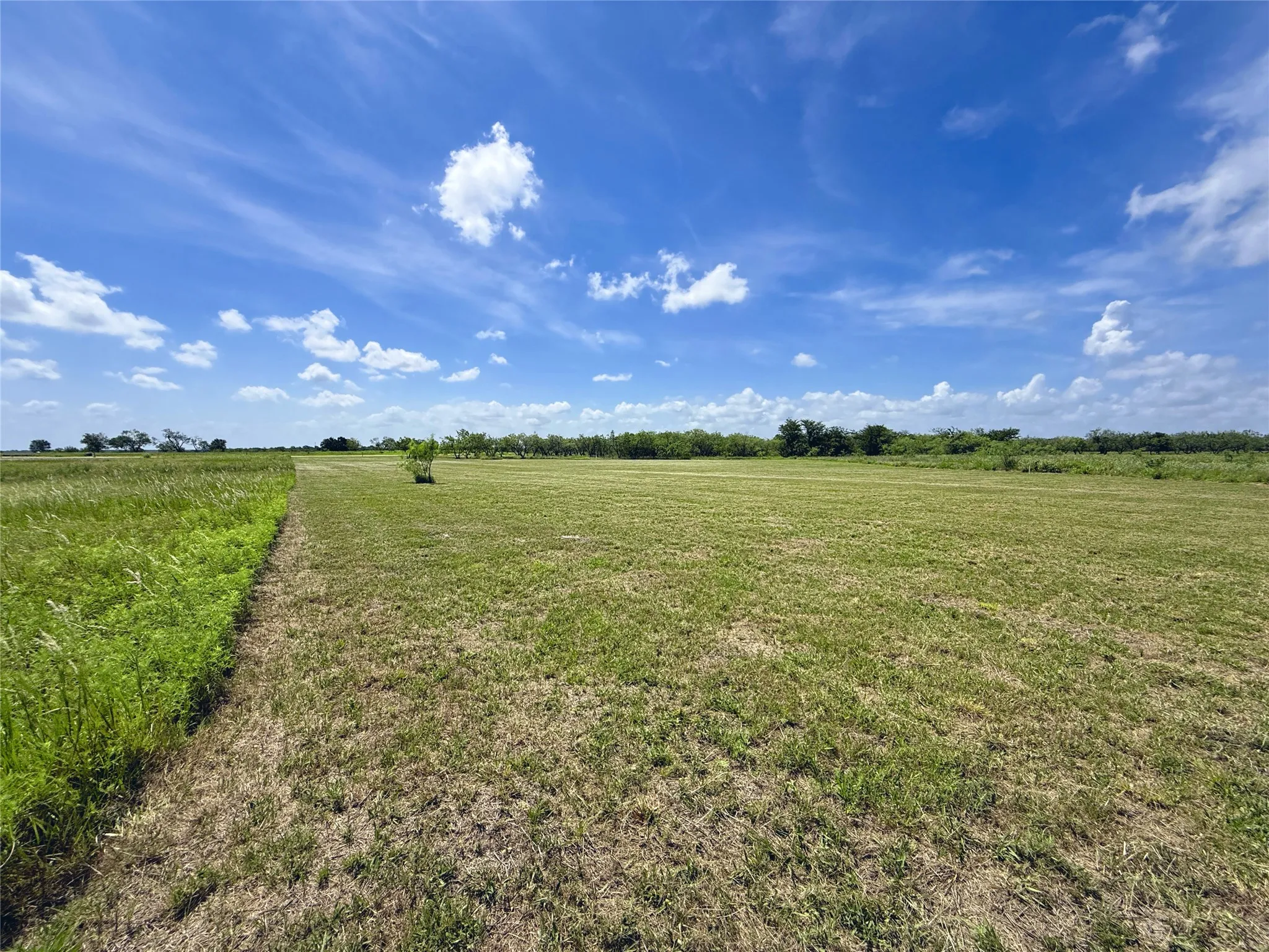 Enjoy peaceful neighborhood surroundings with beautiful skies and easy access throughout the community.