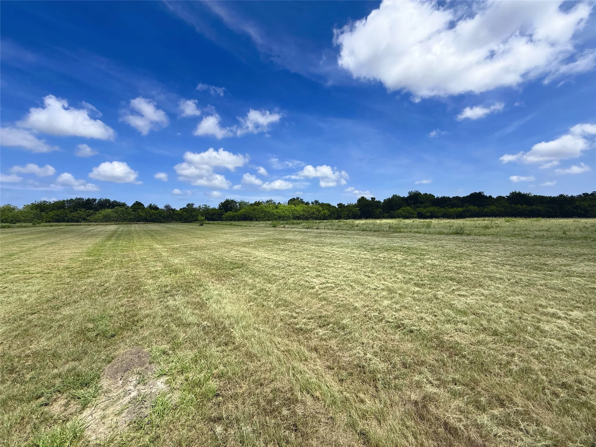 Sweeping open space offers endless possibilities for a custom residence and outdoor entertaining.
