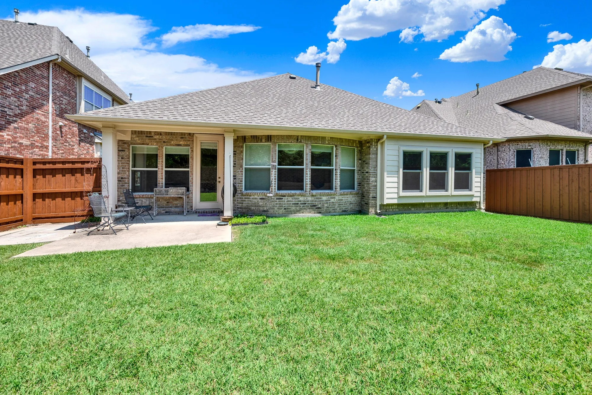 The oversized covered patio extends your living space outdoors and offers plenty of room for seating, grilling, and hosting family and friends.