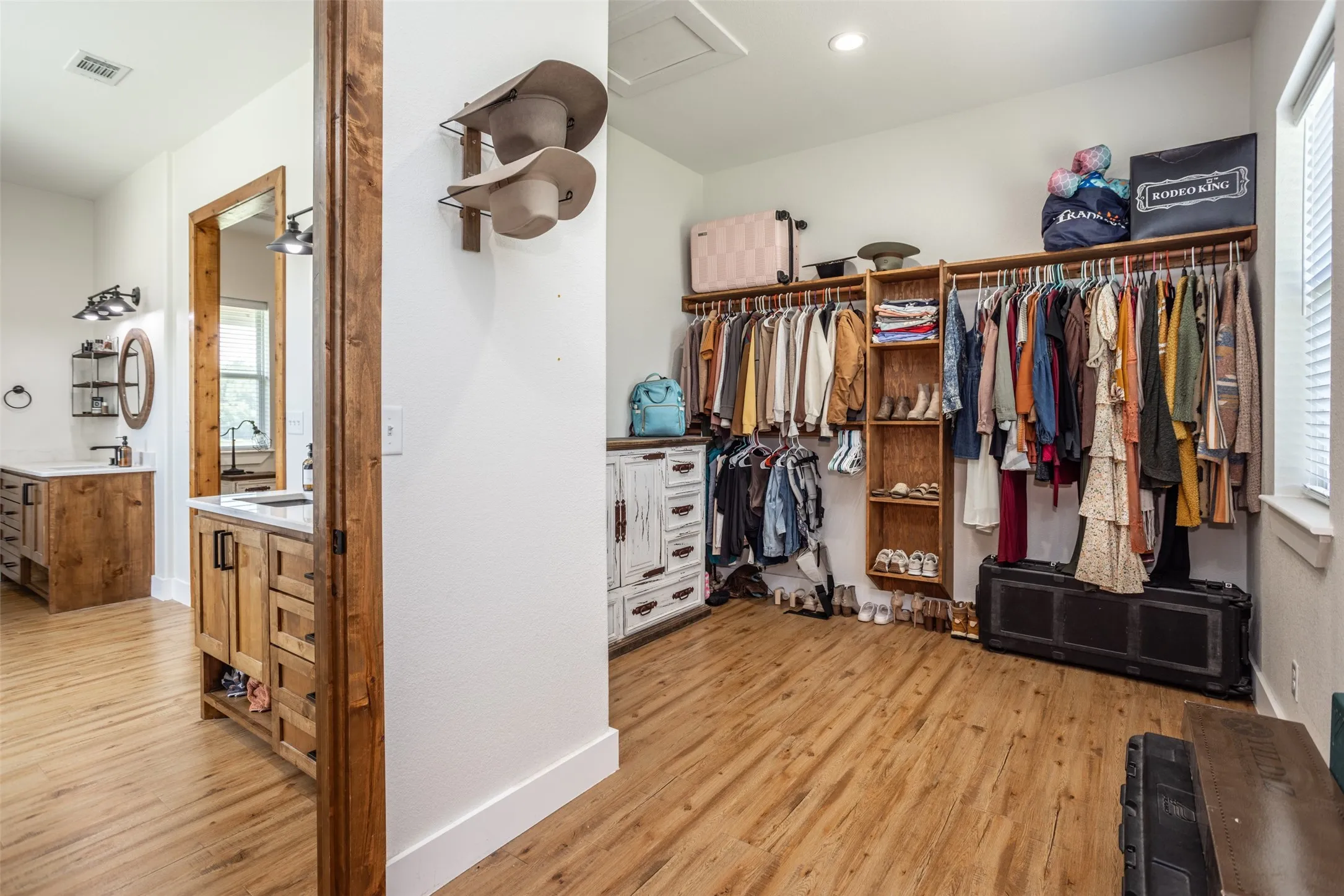 Huge Walk-In Closet with both his and hers sides
