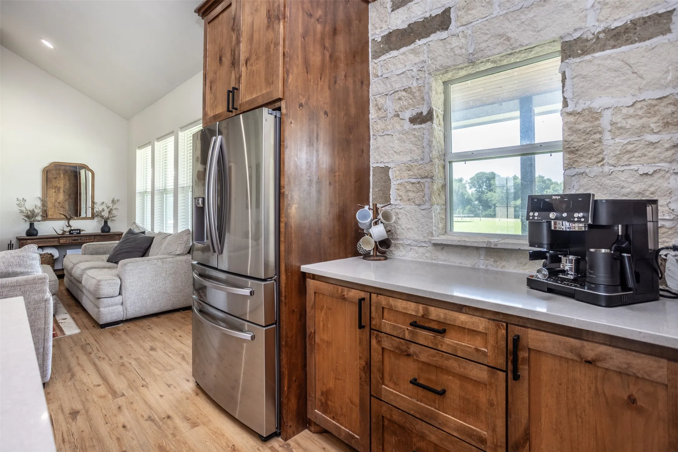 Designated Coffee Bar Space with decorative stone backsplash