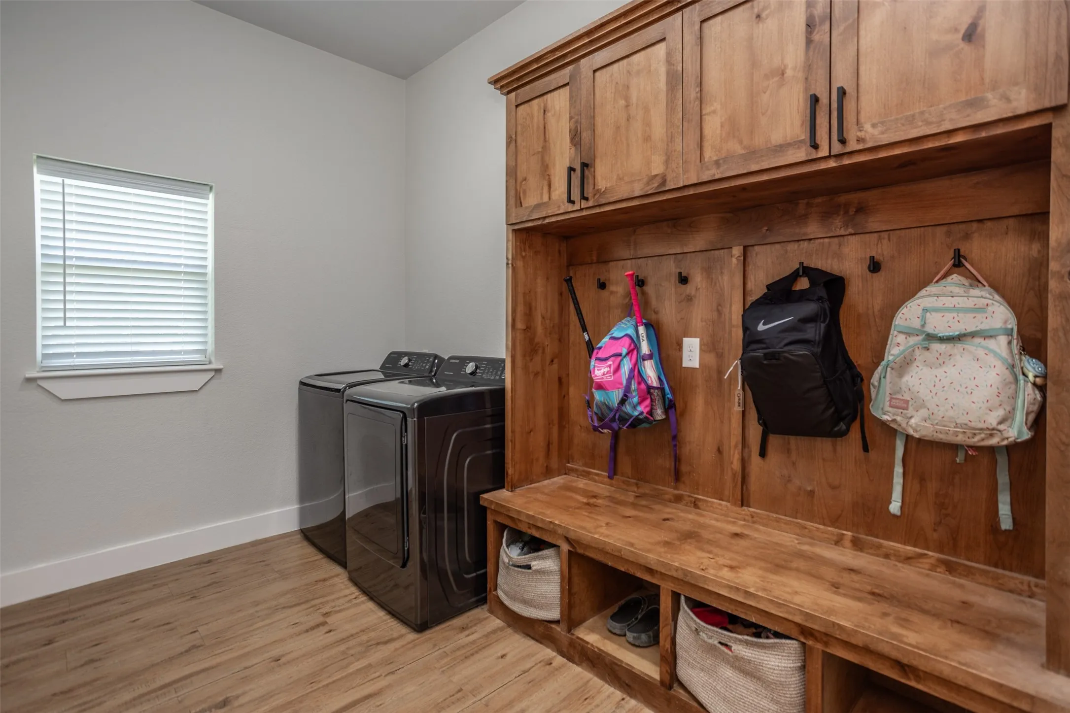 Built in Mud Lockers with Full Size W/D hook-ups and ample laundry storage
