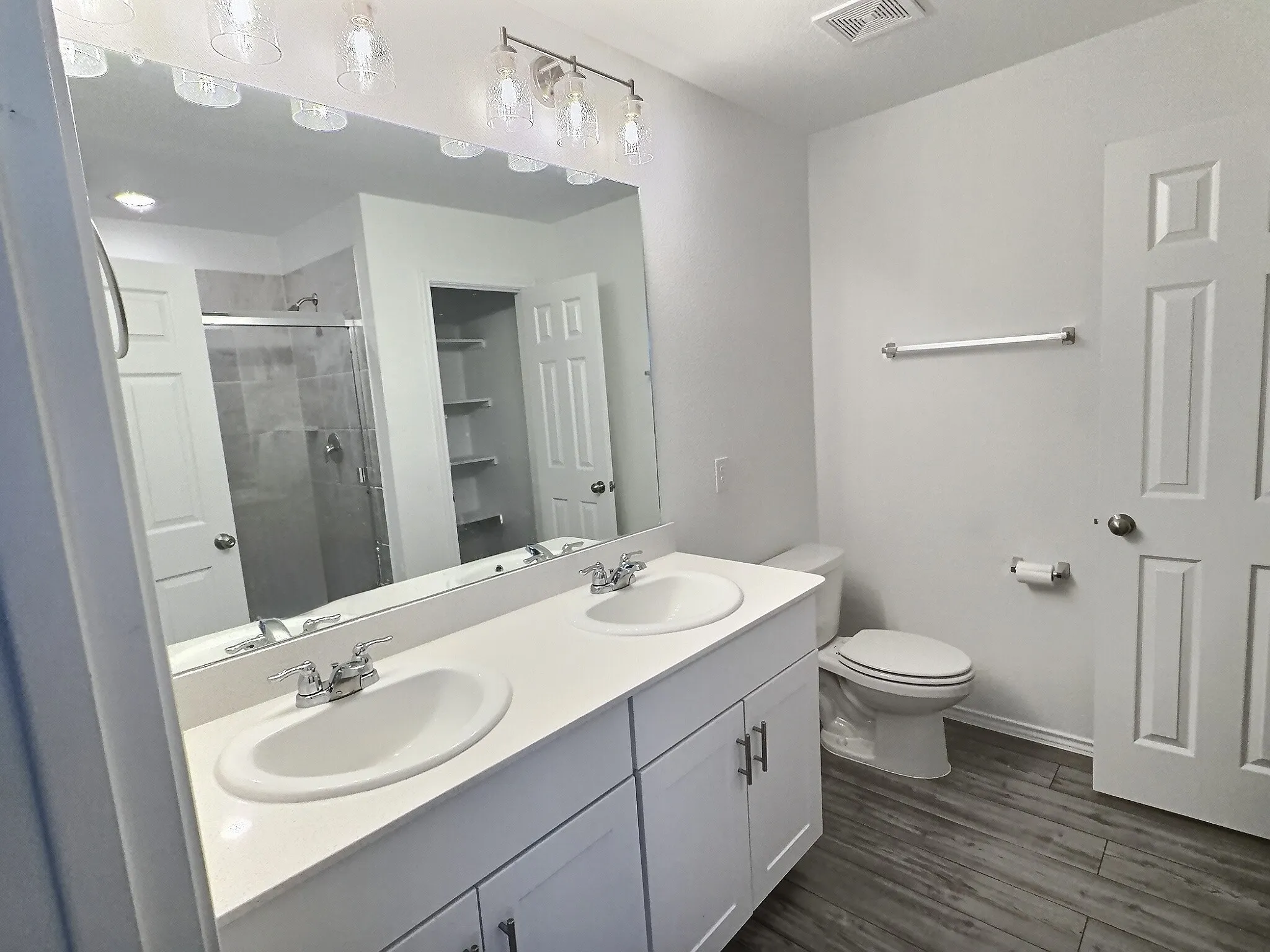 Primary ensuite bath with large shower and large linen closet
