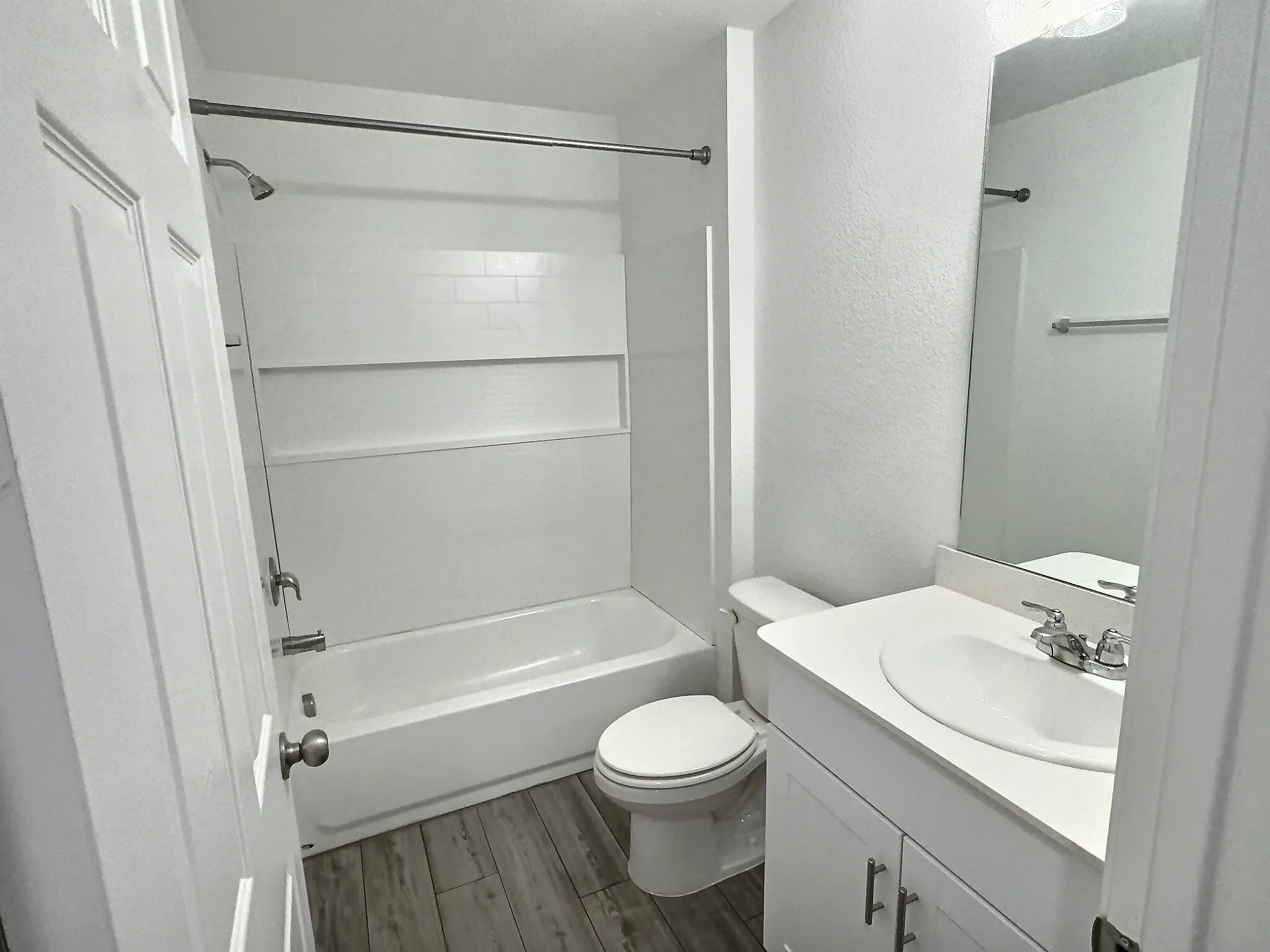 Downstairs bathroom with tub shower combo