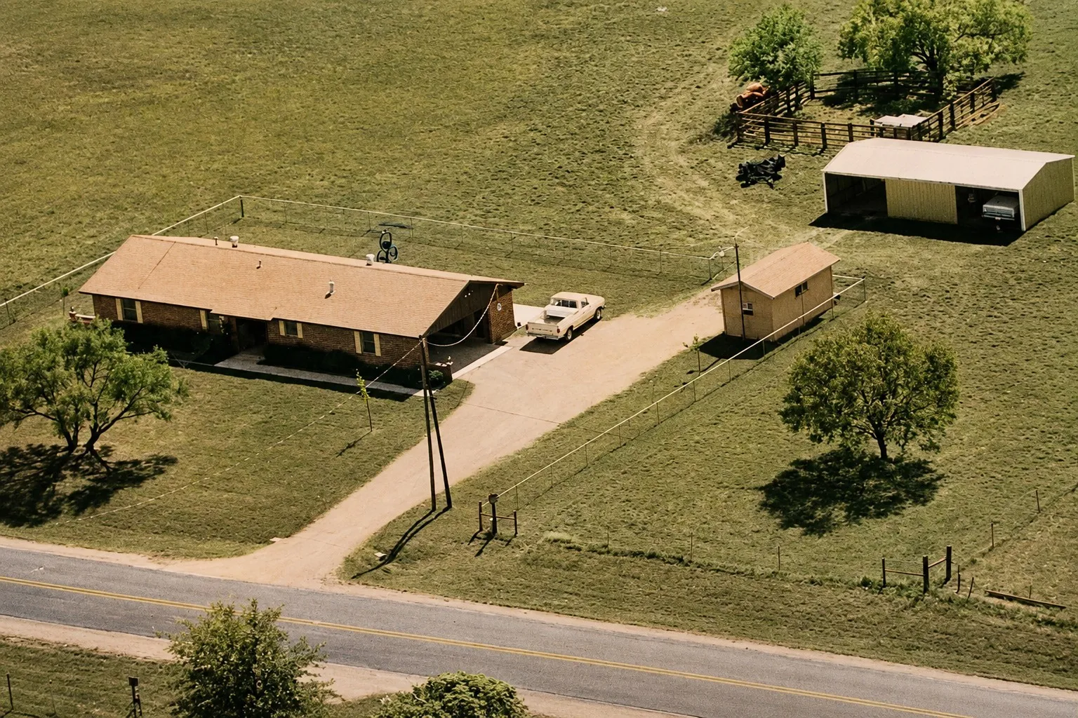 Picture is from the 1980's!  Ranch-style residence featuring a brick exterior and a brown shingle roof