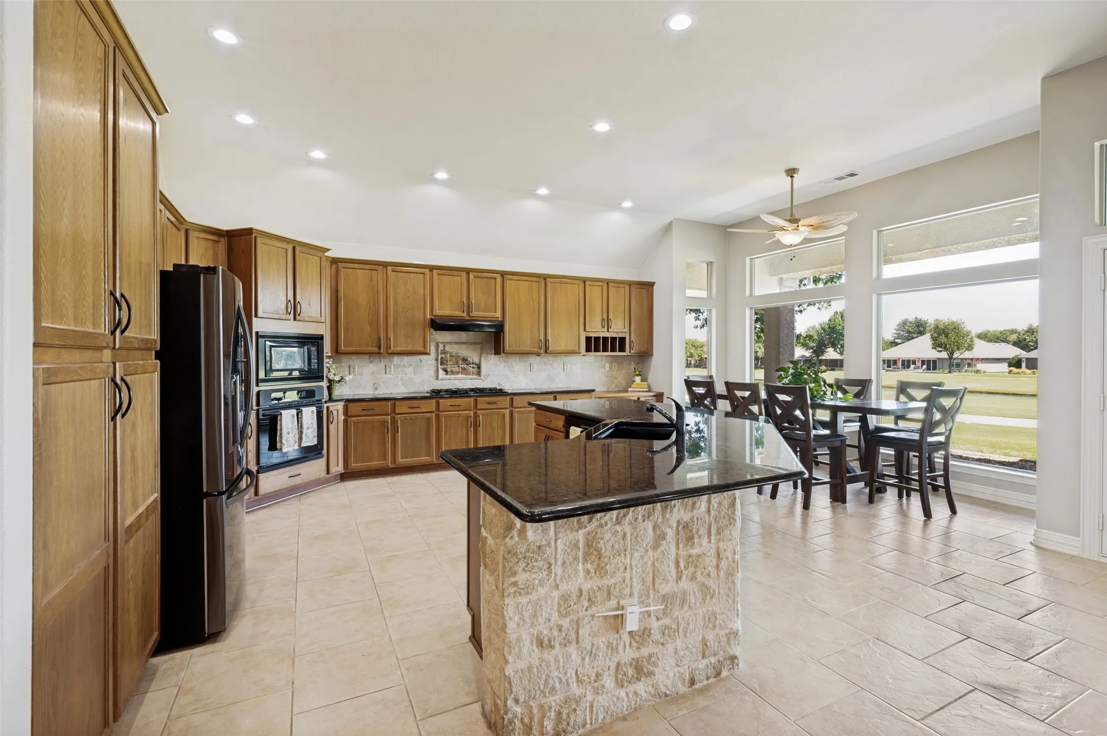 Lovely Kitchen looks out to Pond and Golf Course