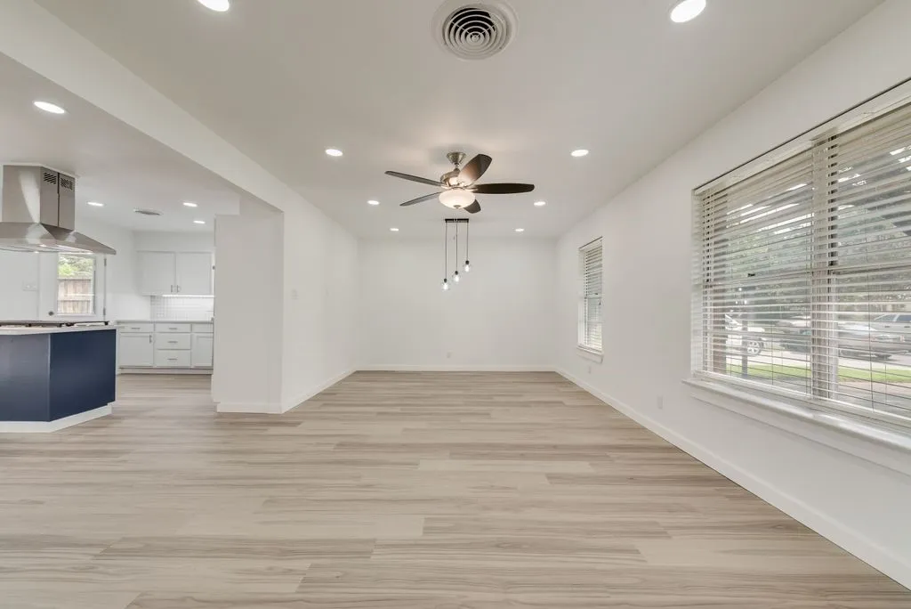 Open Living...Kitchen Island includes 36-inch five burner gas cooktops, ceiling mounted Vent-a-hood, GE profile appliances, WI-FI enabled, double oven, New cabinetry, quartz countertops!