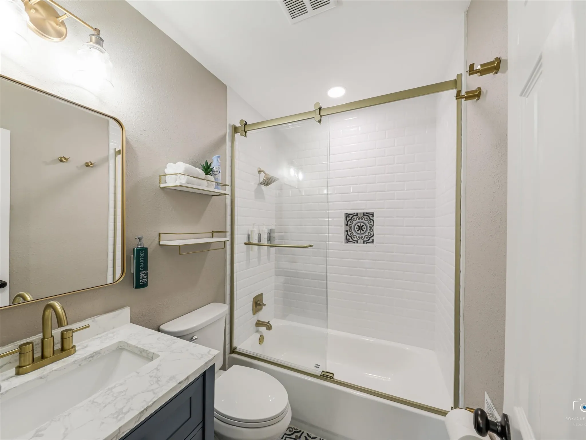 Updated 2nd Bathroom with brushed bronze fixtures