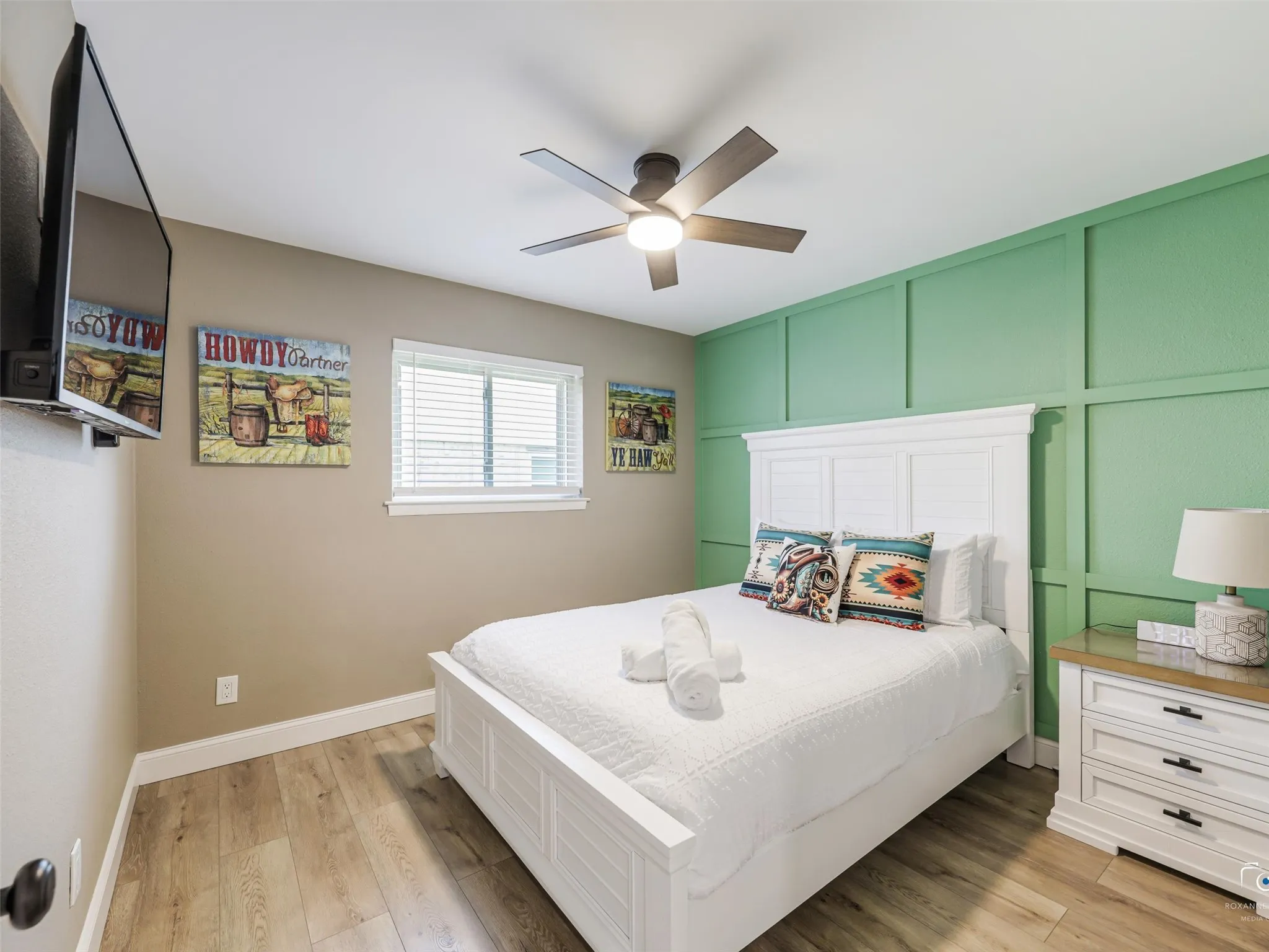Bedroom 2 with designer accent wall.