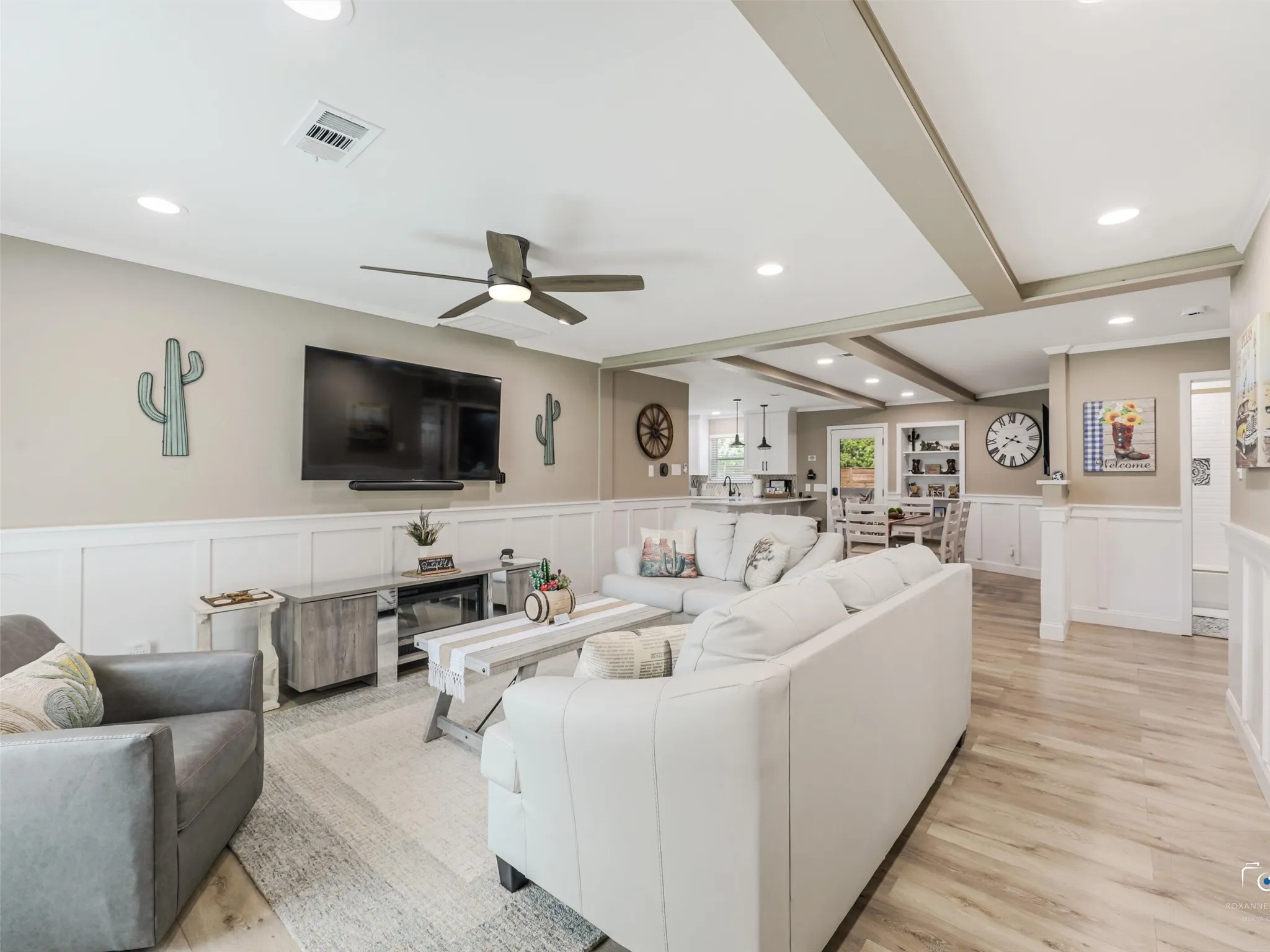 Open living area to dining and kitchen