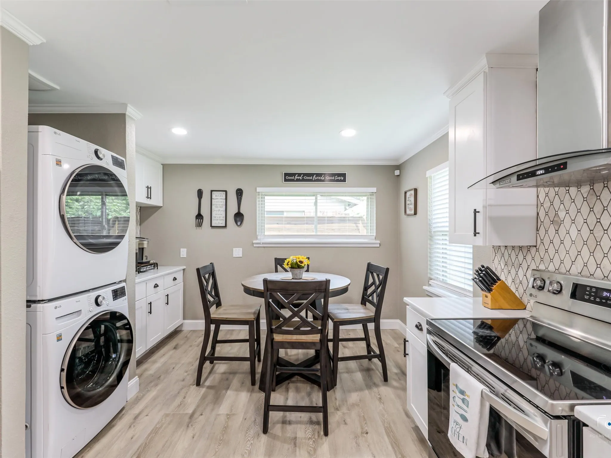 Breakfast area with coffee bar and cabinets