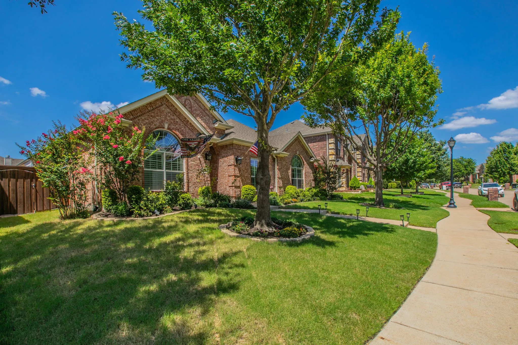 well maintained trimmed landscaping.